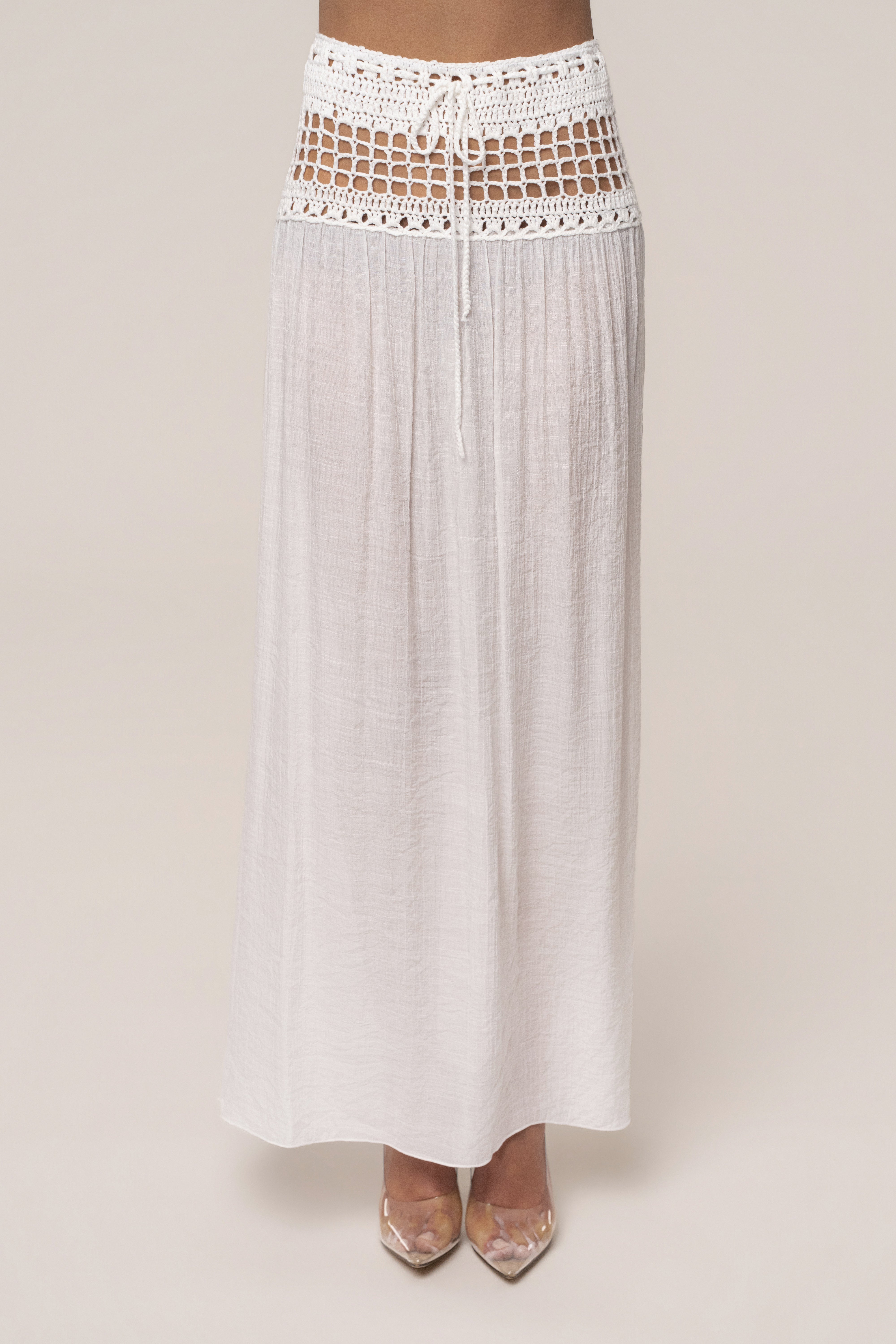 Ivory crochet maxi skirt by JLUXLABEL, flowing resort bottoms with intricate crochet details, perfect for summer or beachwear.