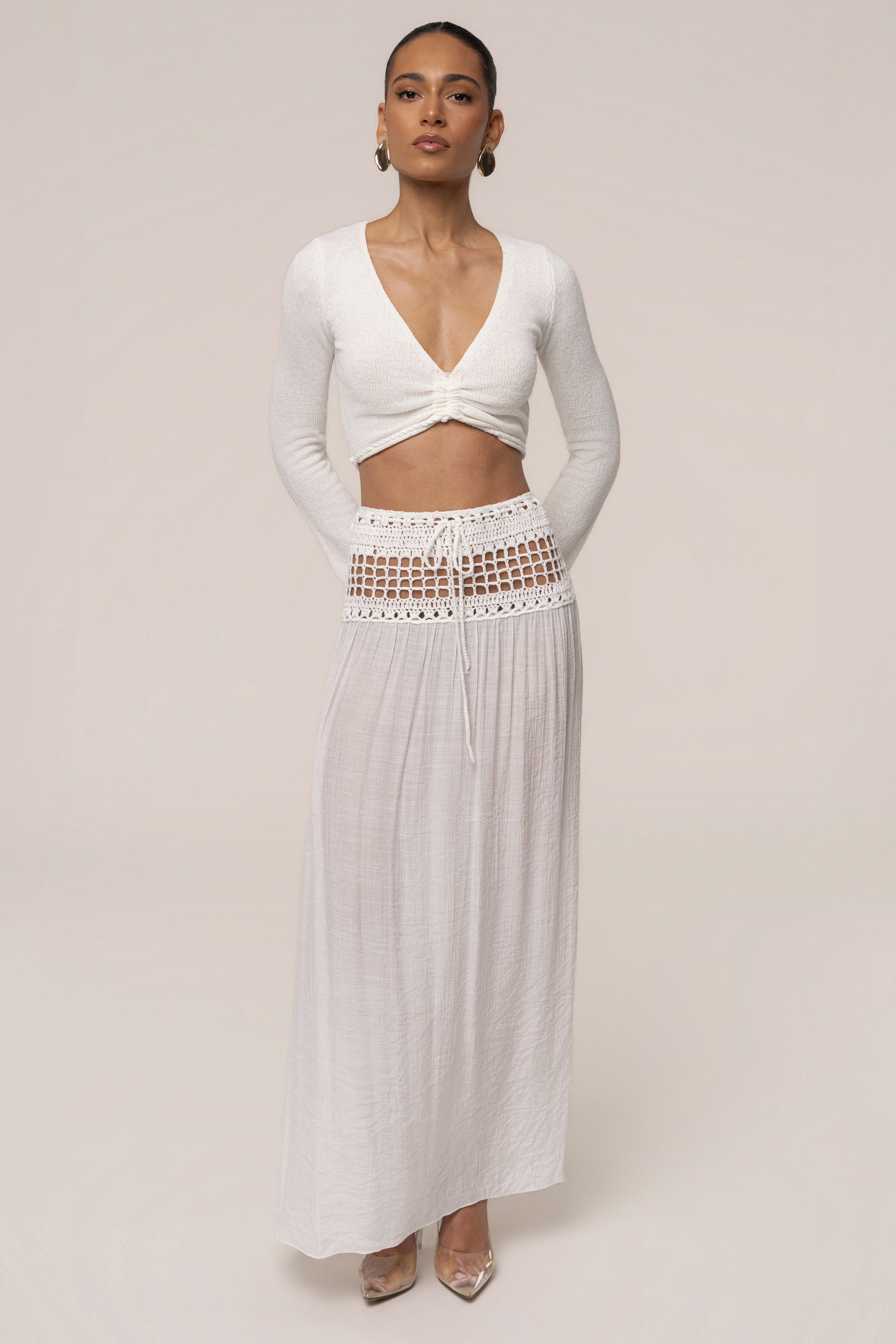 Ivory resort crochet maxi skirt by JLUXLABEL, featuring a flowing, boho-style design perfect for summer beachwear.