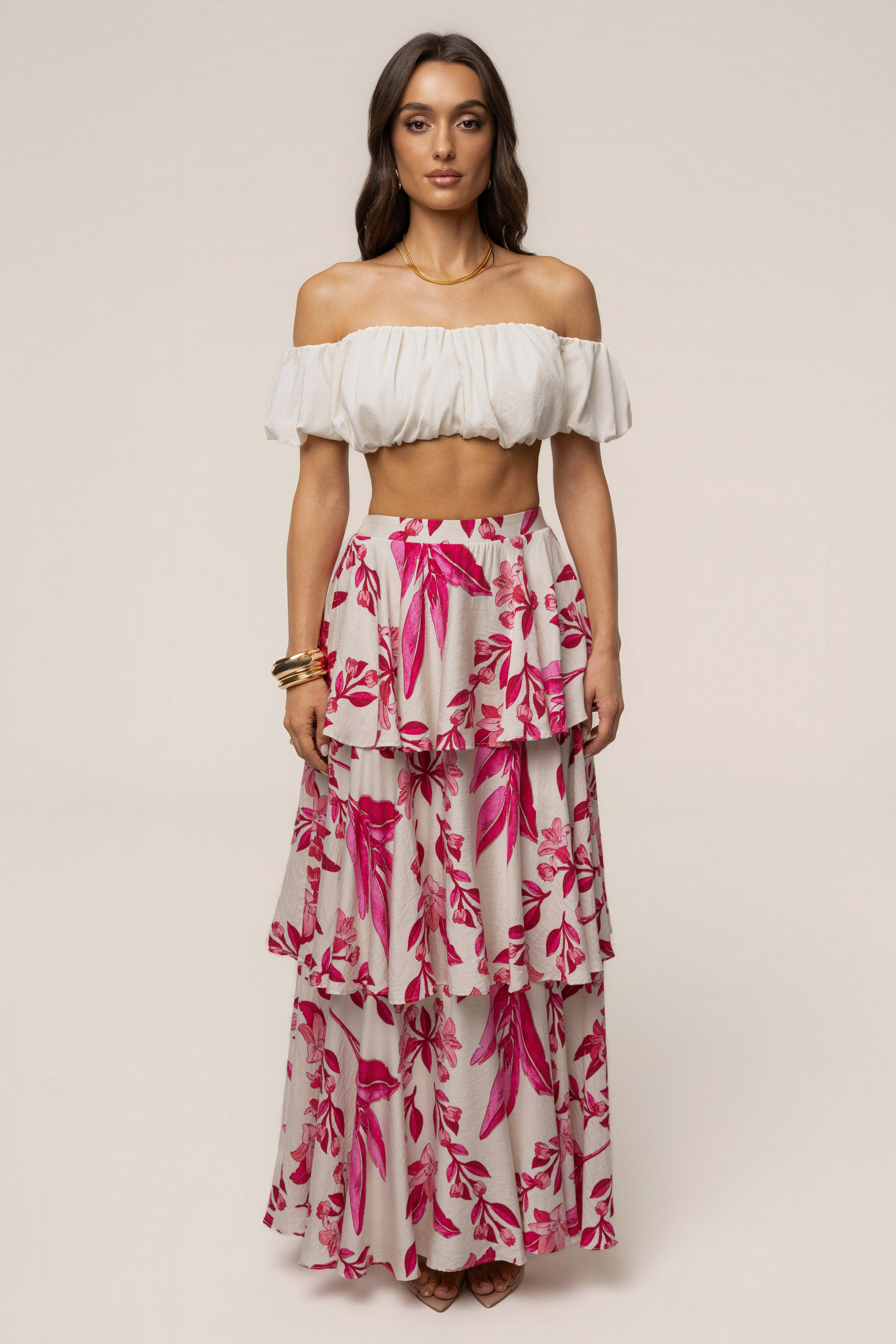 Pink floral Jasmine ruffle maxi skirt by JLUXLABEL, featuring a flowy design and elegant ruffle details, perfect for summer wear.