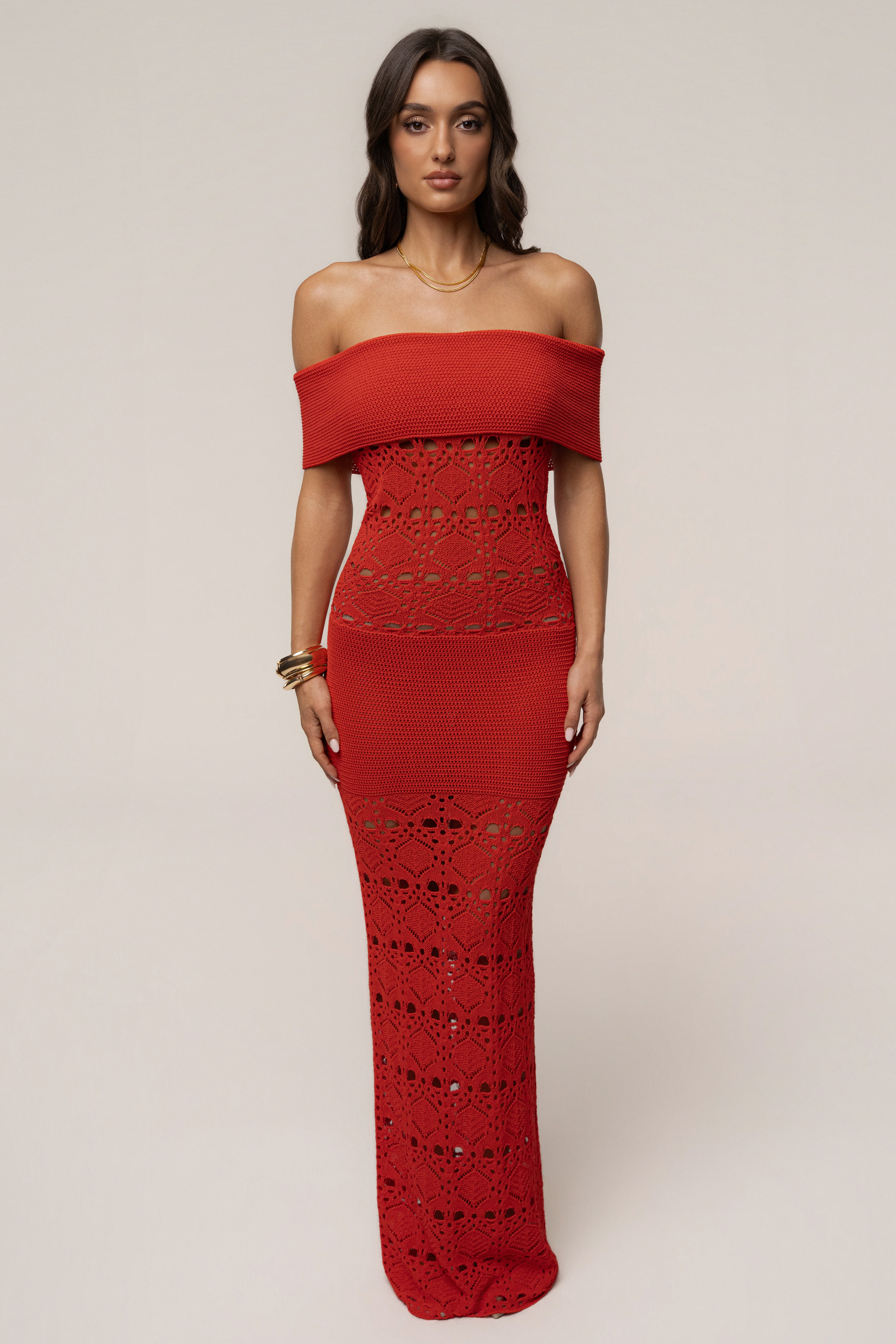 Red JLUXLABEL Resort Nights maxi dress displayed on a hanger with flowing fabric and a stylish, relaxed design.