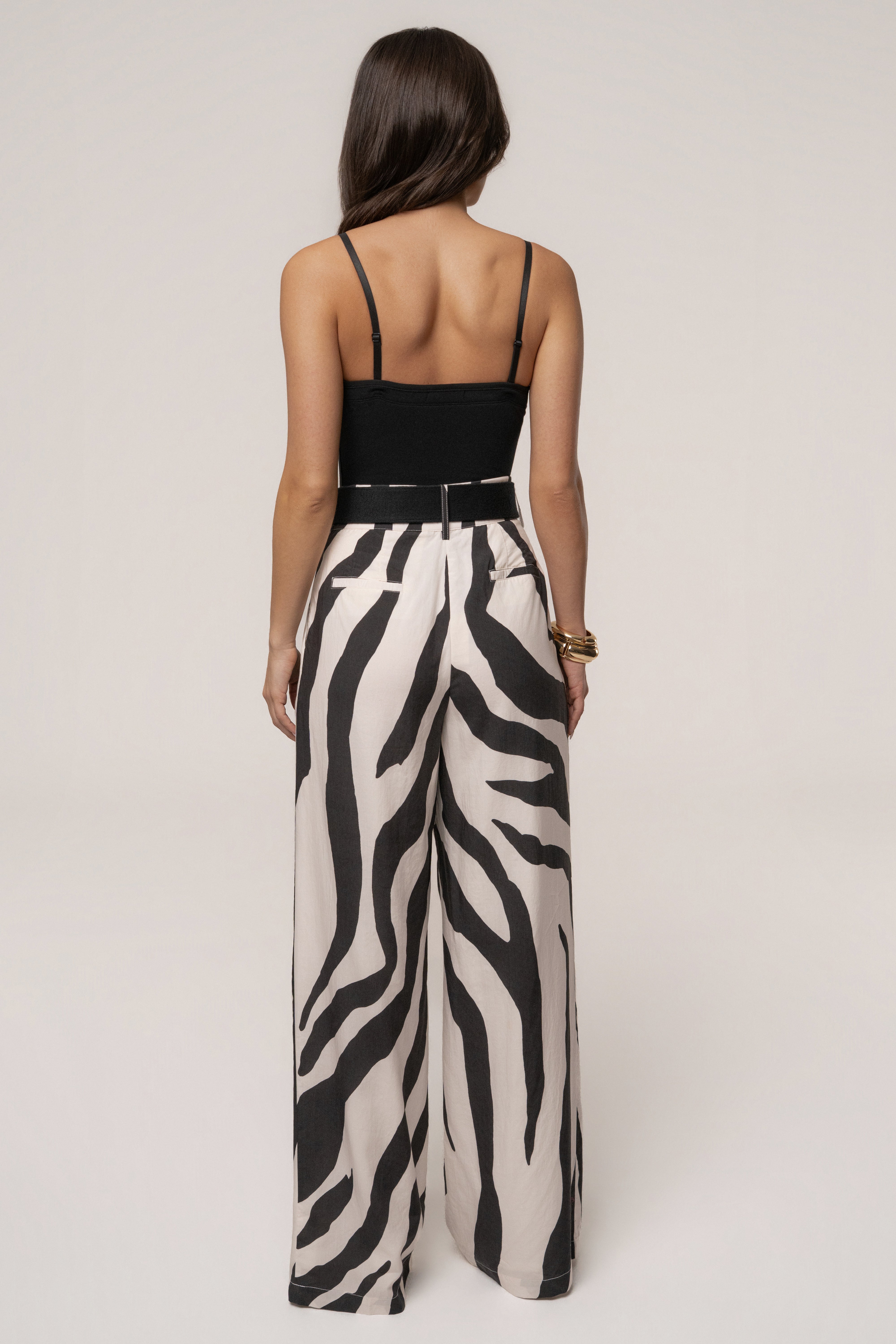 JLUXLABEL Zebra Prime Trouser in black and white zebra print, stylish bottoms with a tailored fit for a bold fashion statement.