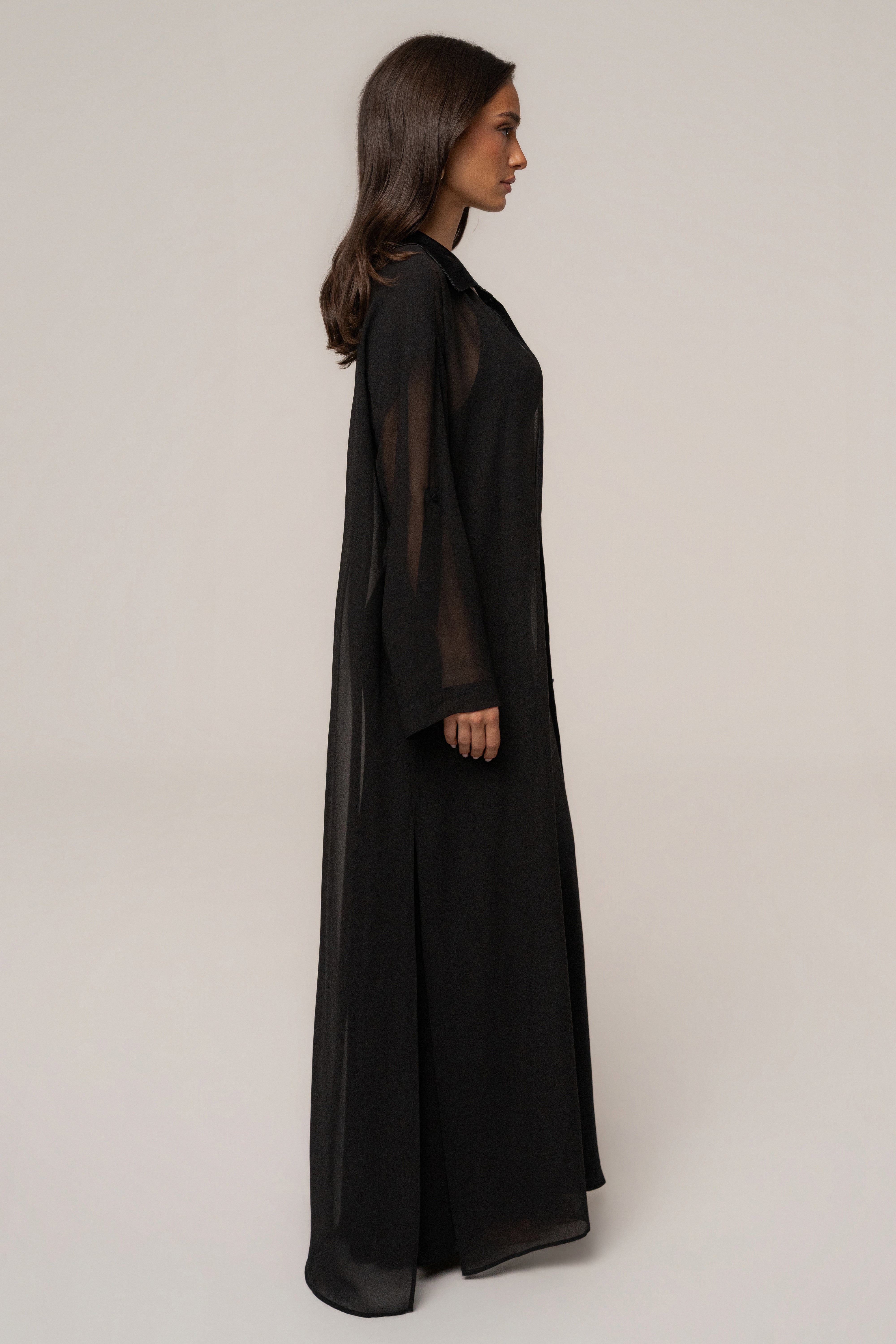 Black Ocean Breeze cover-up dress by JLUXLABEL featuring lightweight fabric and relaxed fit, perfect for beach or poolside wear.