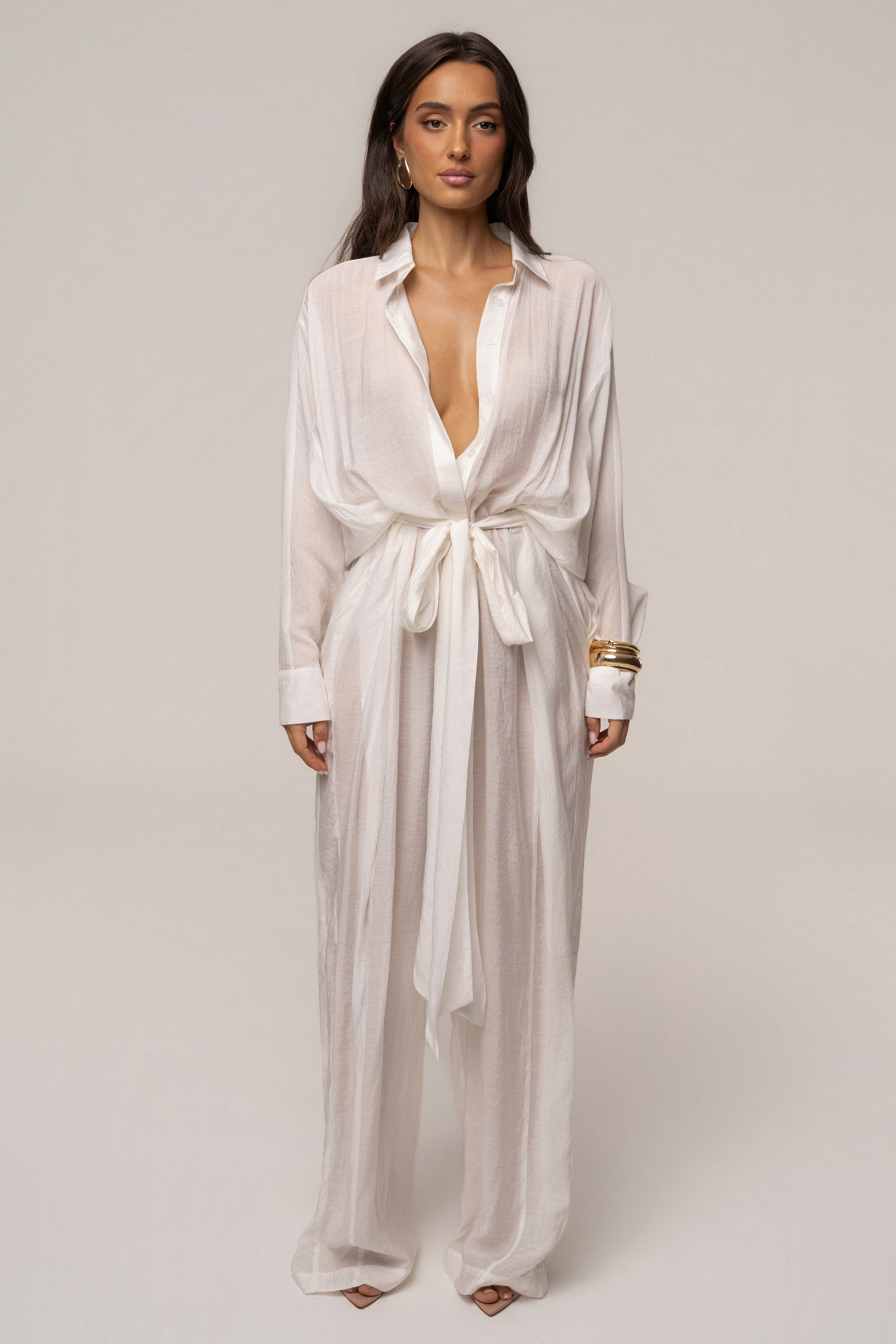 Ivory JLUXLABEL Soho tailored jumpsuit with wide-leg pants and sleeveless design, displayed on a mannequin.