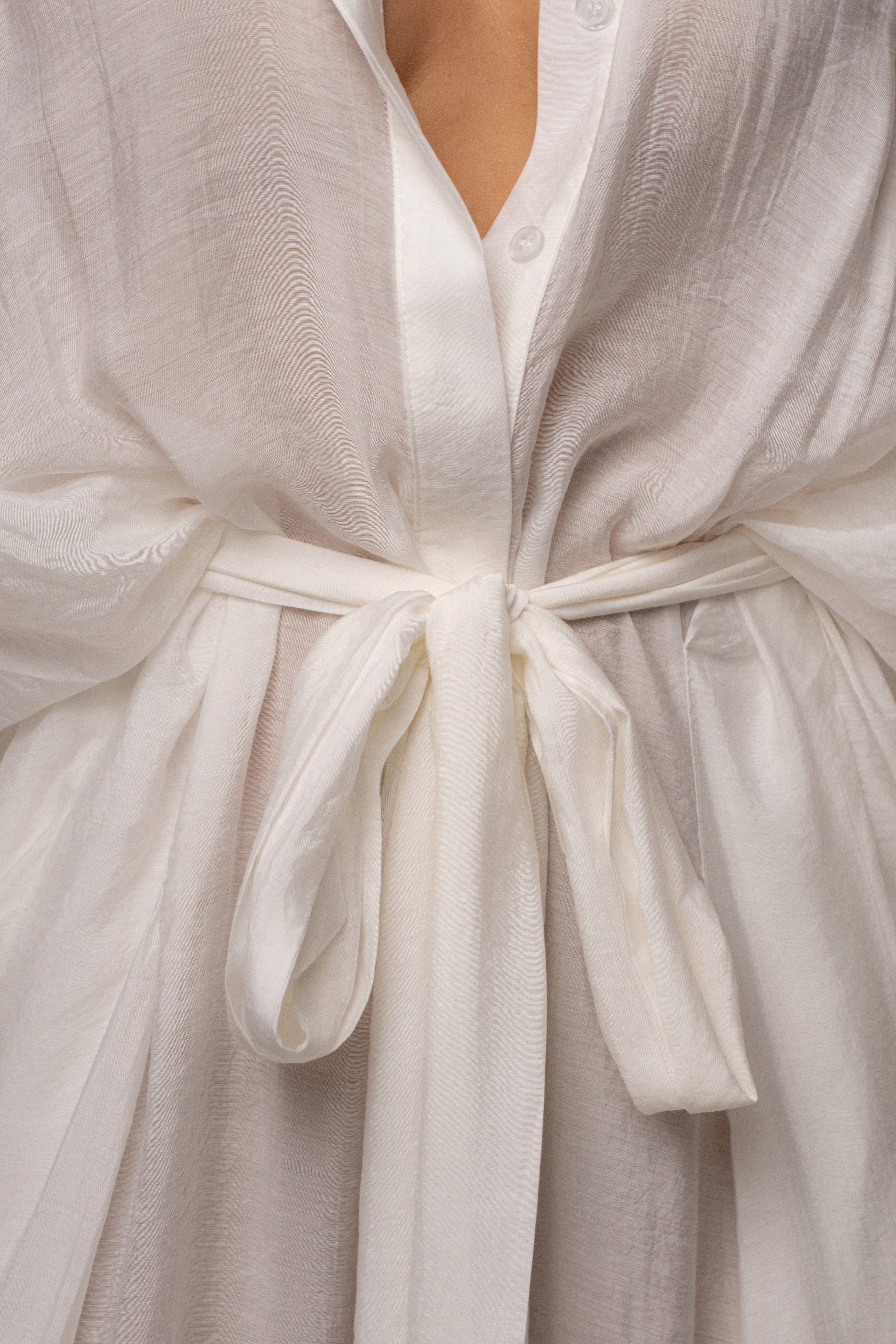 Ivory JLUXLABEL Soho tailored jumpsuit with wide legs and sleeveless design, stylish and elegant for modern fashion.