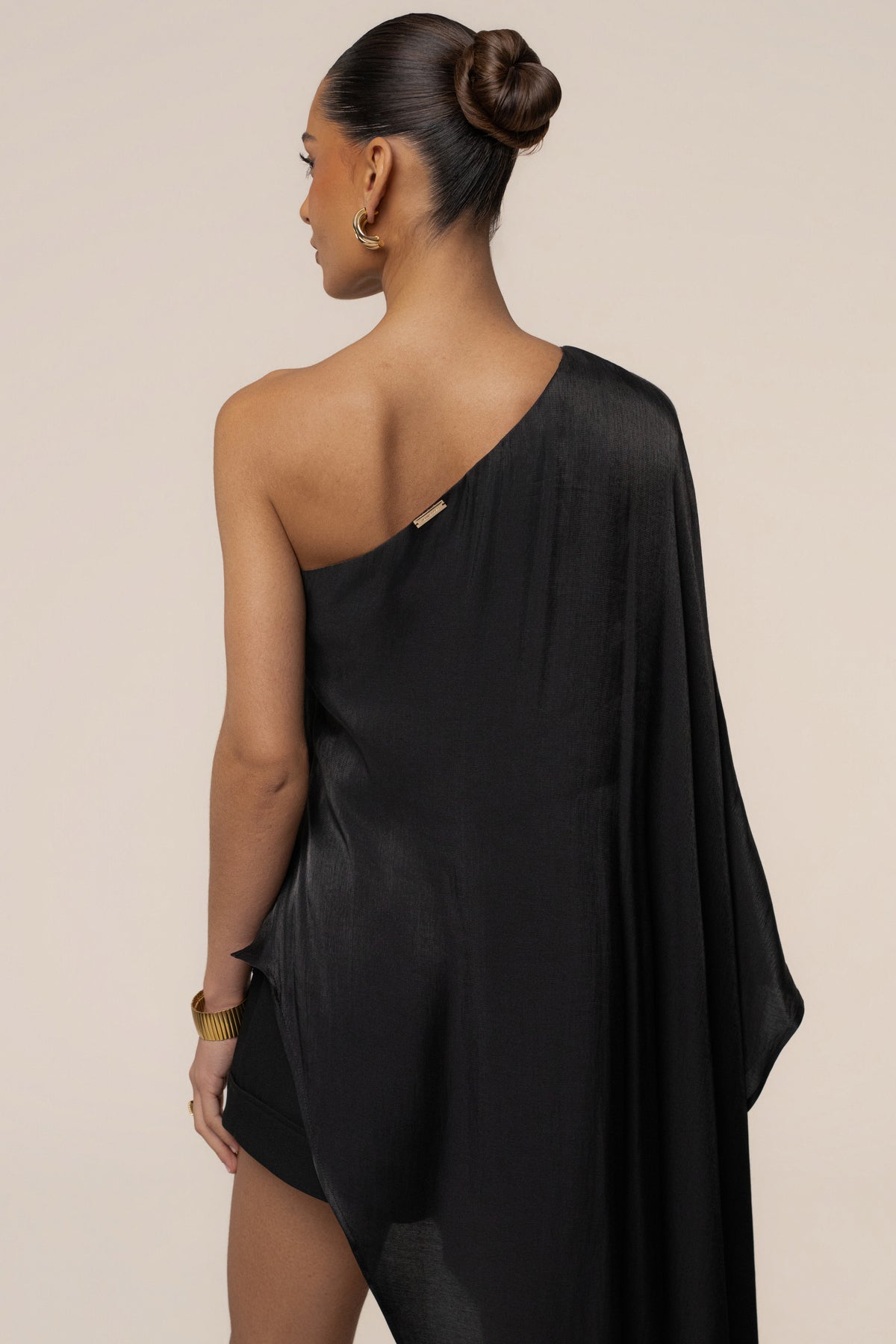 Black Cher Iridescent top by JLUXLABEL, showing a close-up of the shimmering fabric and stylish design details.