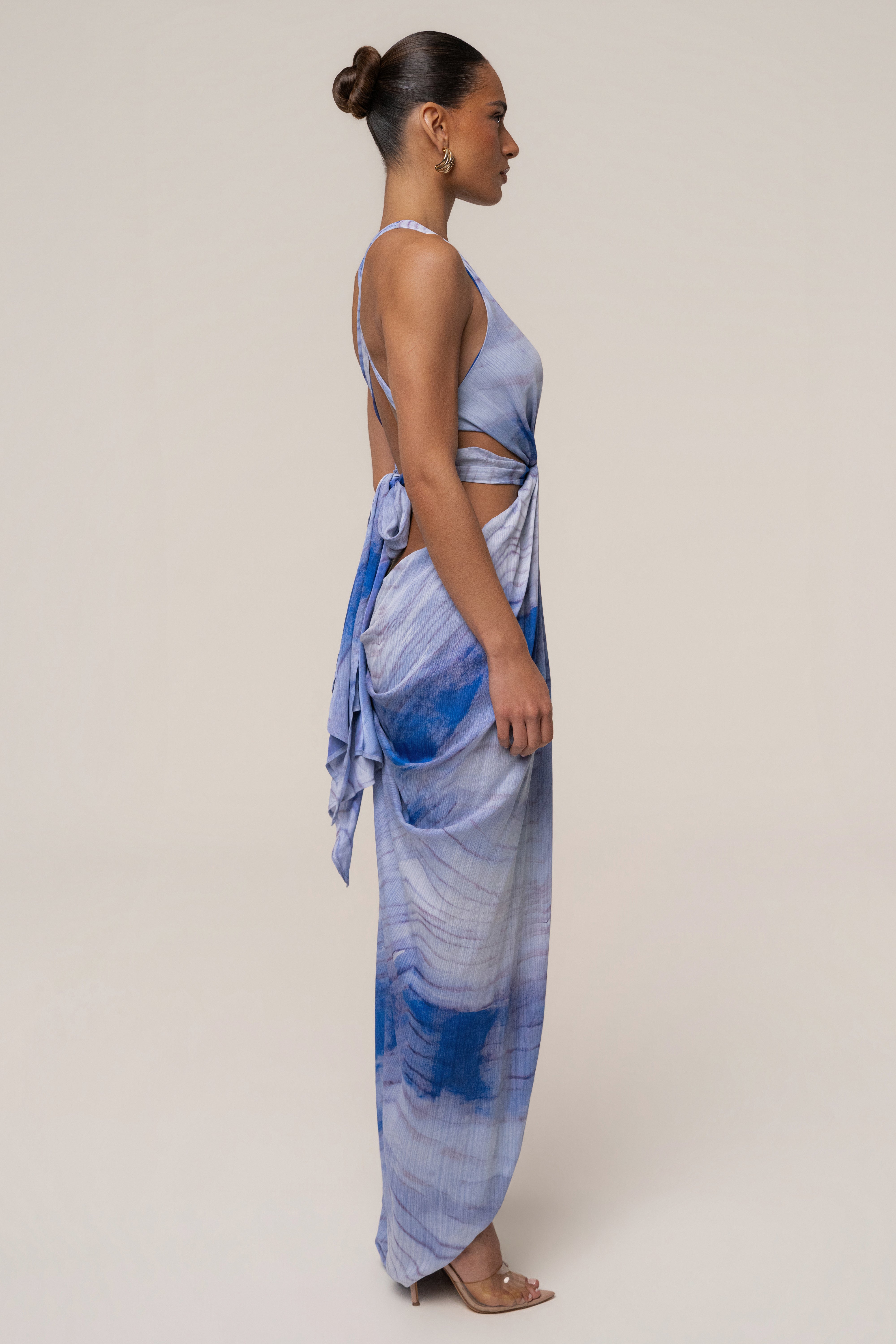 Blue Coastline Maxi Dress by JLUXLABEL, flowing fabric with a fitted bodice and ankle-length design, perfect for summer occasions.