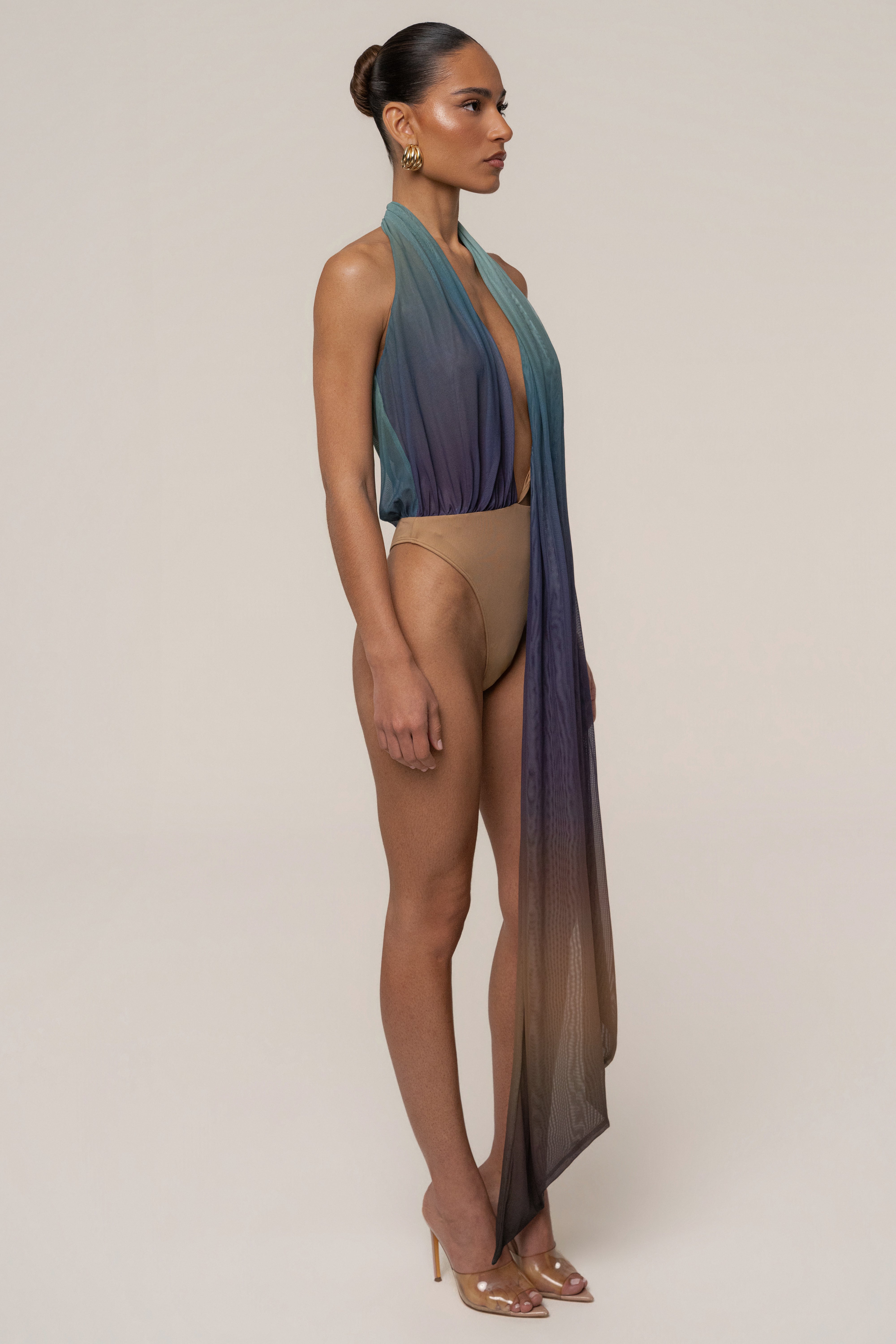 JLUXLABEL Lunar Shadow Bare Form plunge bodysuit as a stylish black top with a deep V neckline and sleek fit.