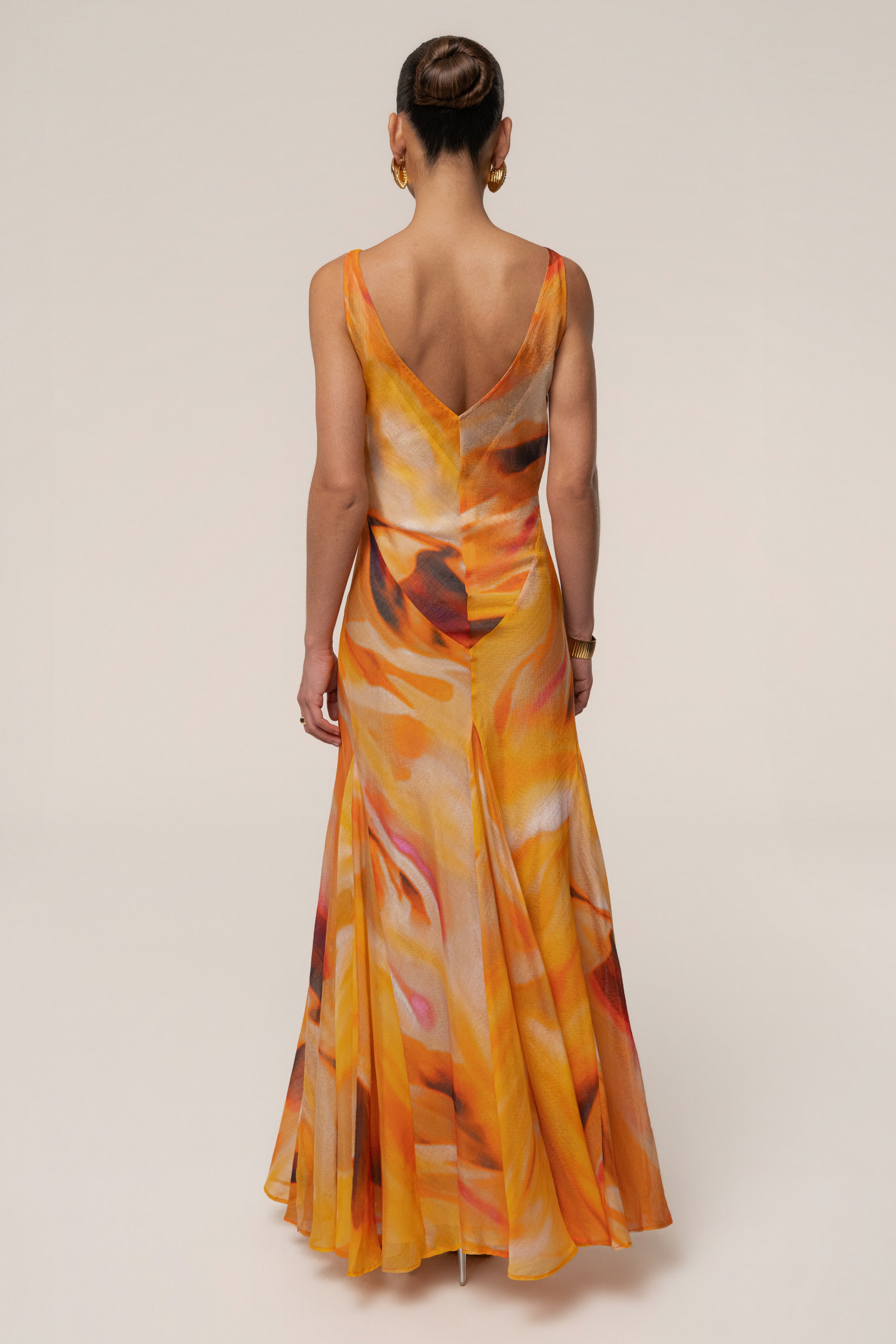 Yellow Prism Tide maxi dress by JLUXLABEL featuring a flowing design and vibrant color, perfect for summer or special occasions.