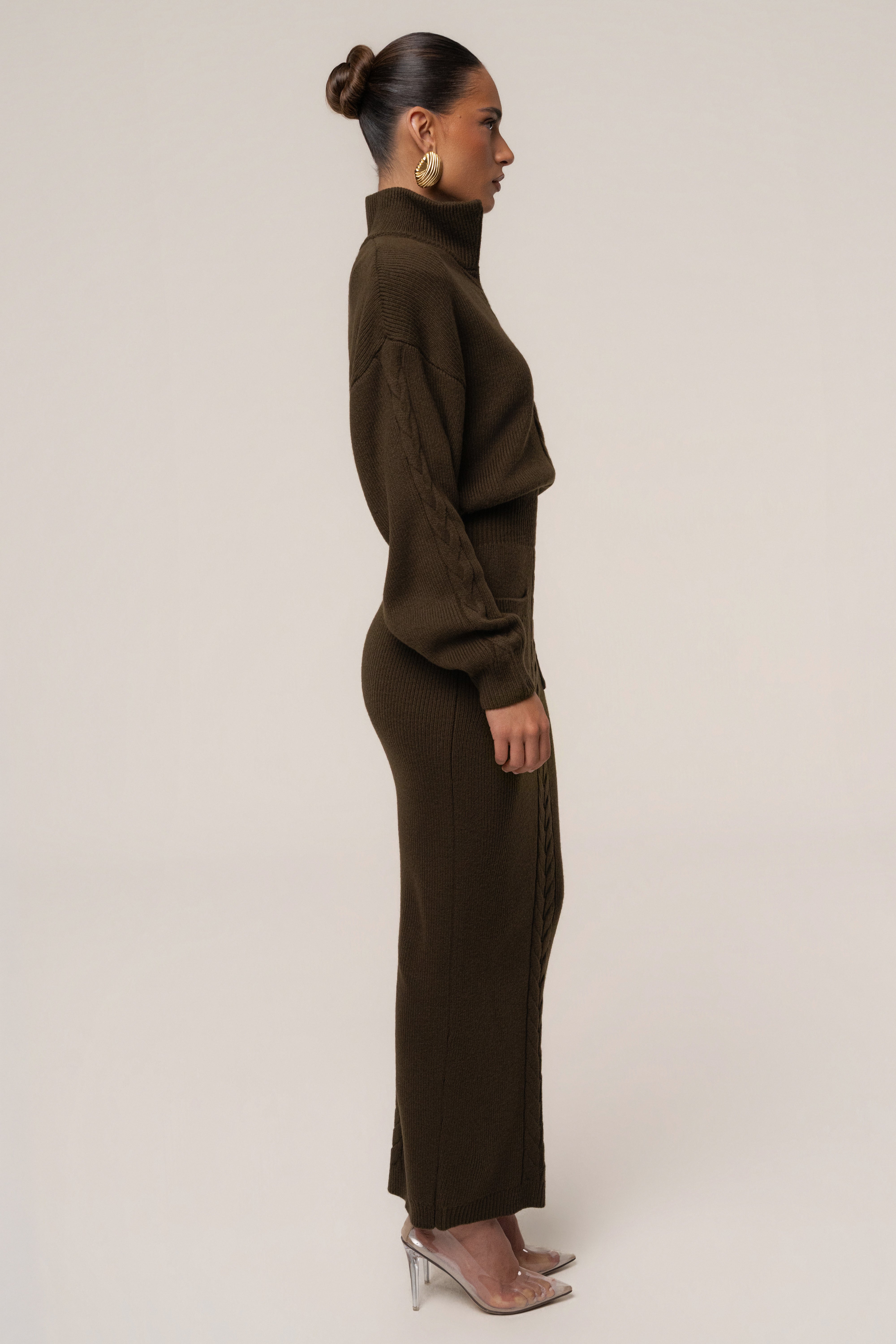 Chocolate ribbed dress by JLUXLABEL featuring a cozy, fitted design perfect for casual or stylish occasions.