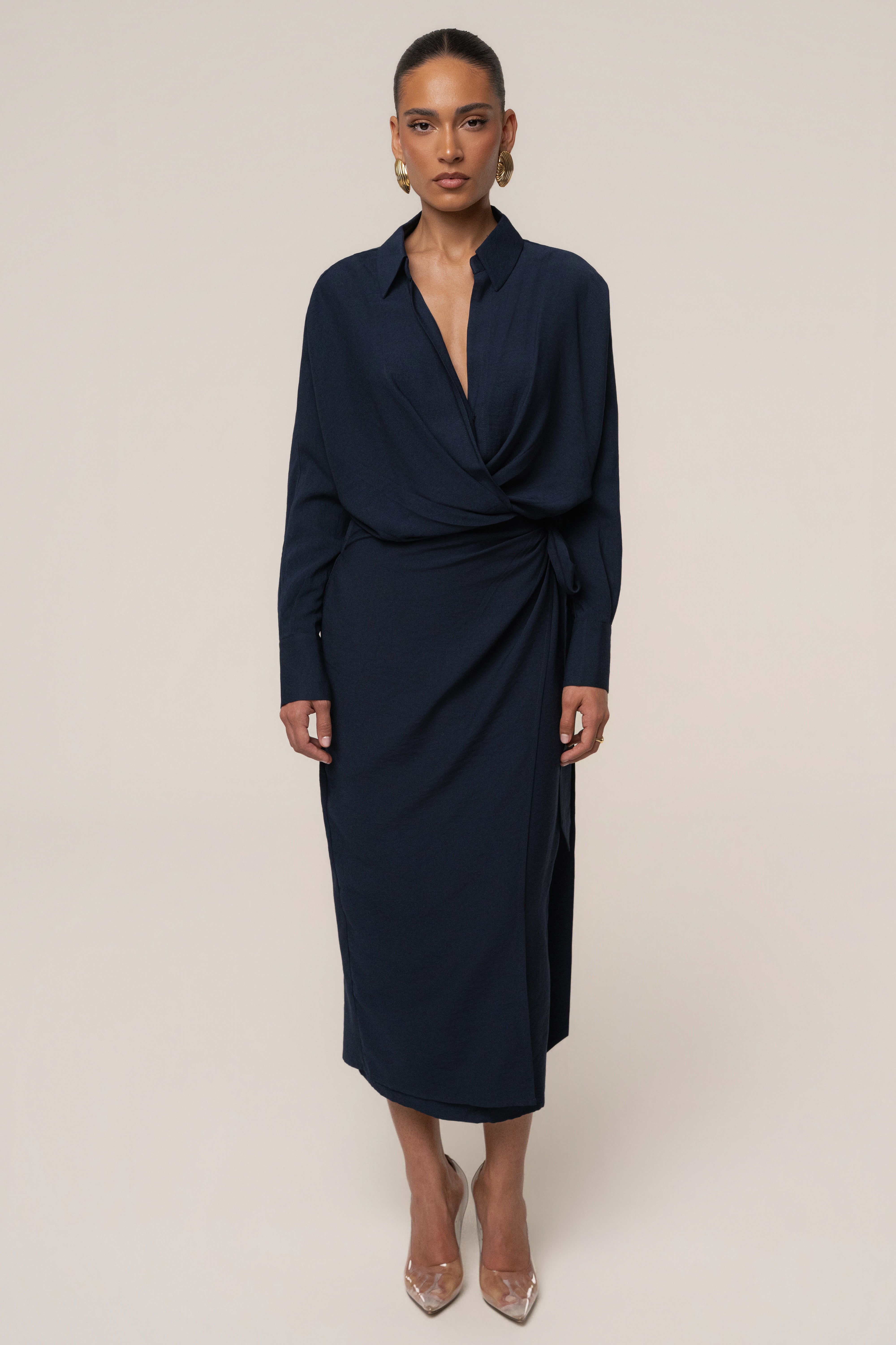 Navy Skyline Wrap Midi Dress by JLUXLABEL featuring a stylish wrap design and midi length, perfect for elegant occasions.