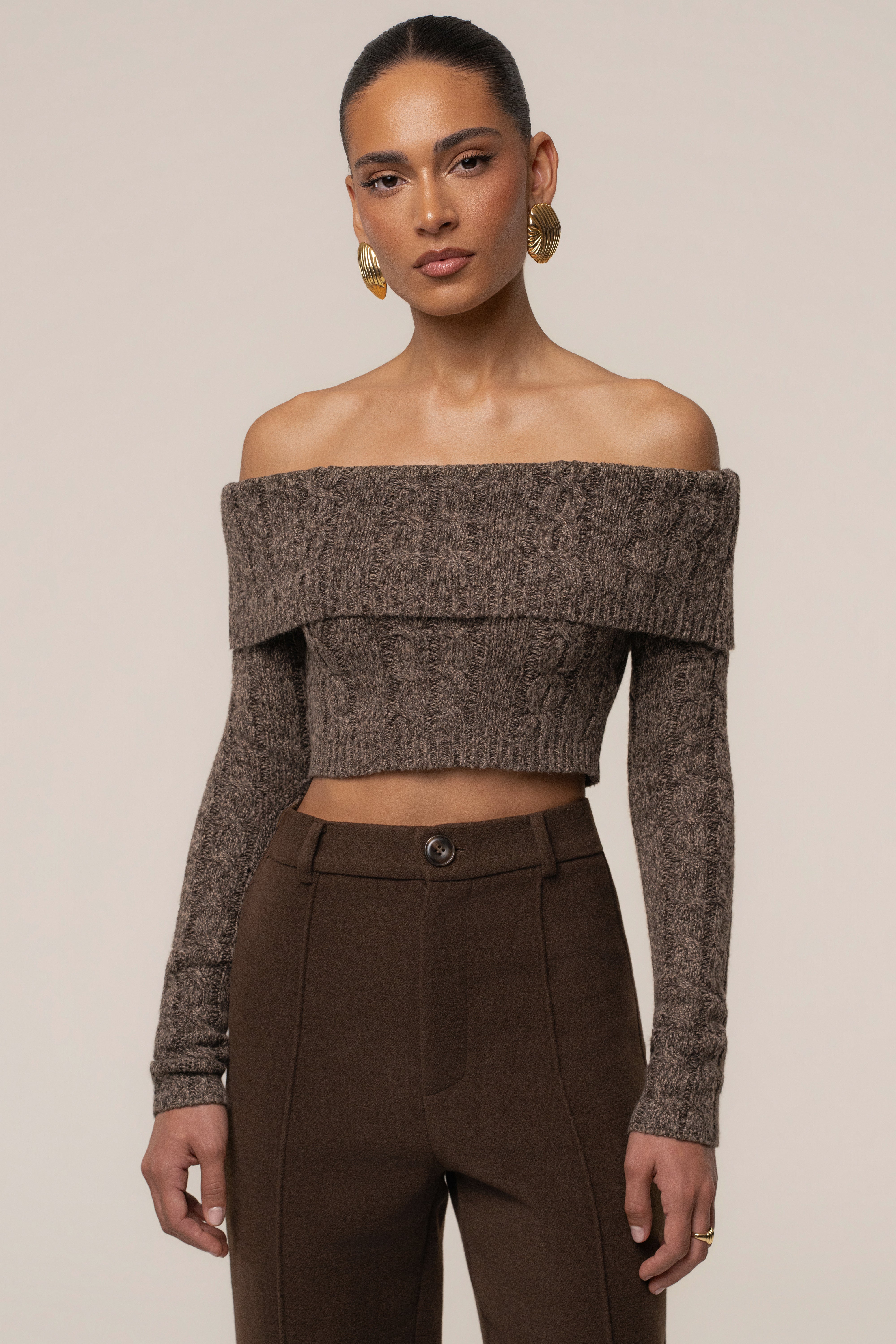 Brown JLUXLABEL Off Duty sweater top with a cozy knit design, featuring a relaxed fit and ribbed cuffs.