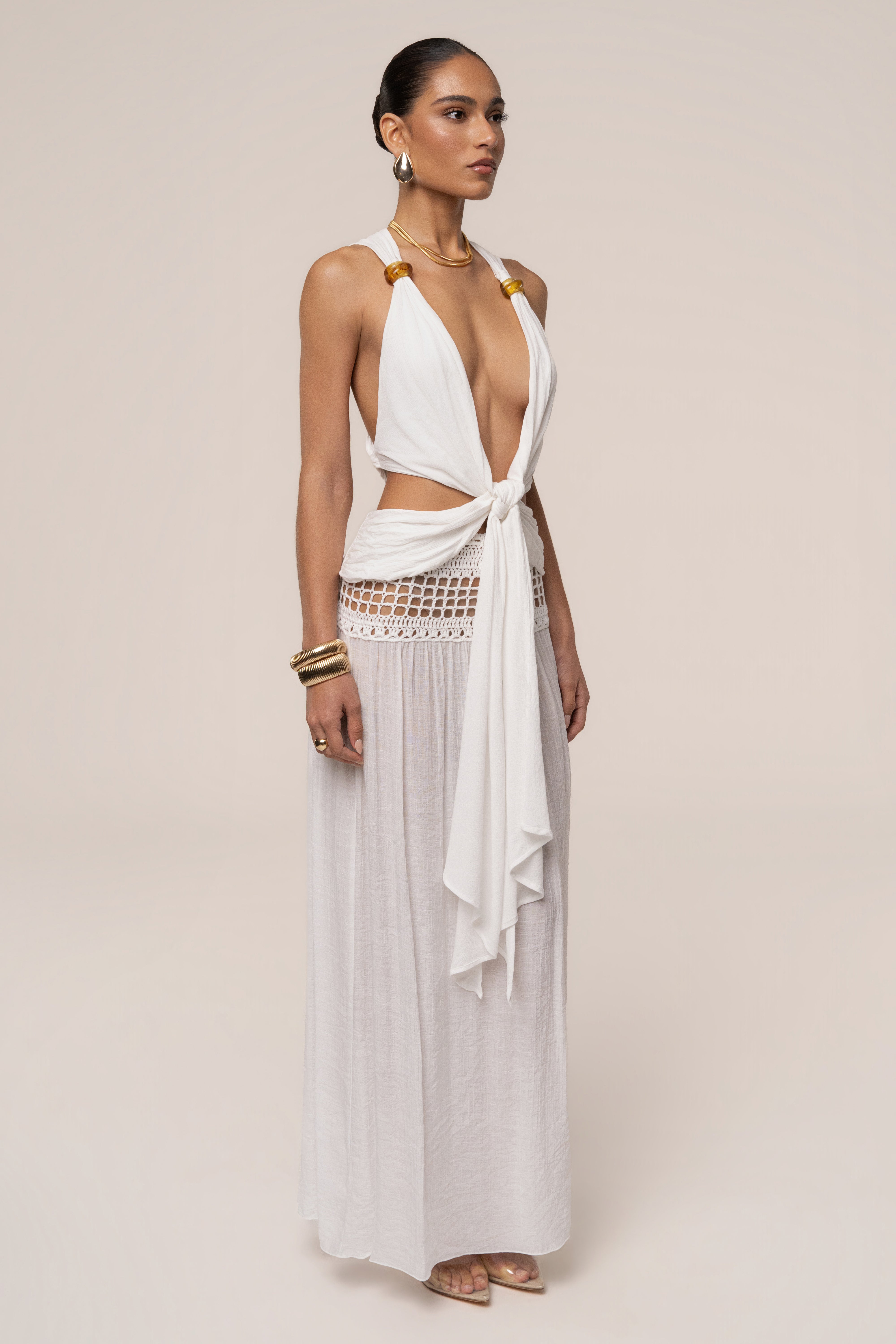 White Tulum Drape Top by JLUXLABEL, showcasing a flowy, stylish women's top with draped design and lightweight fabric.