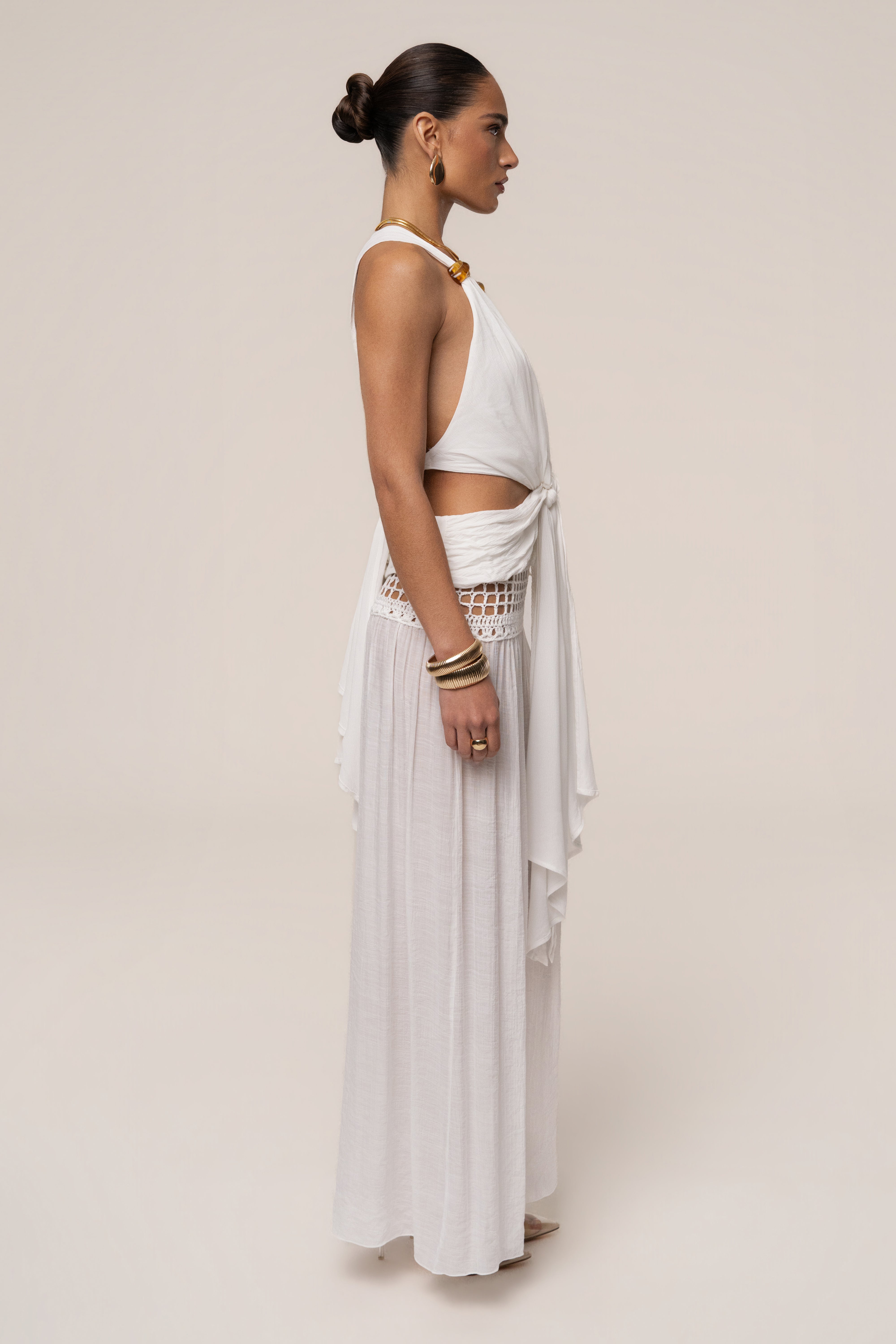 White Tulum Drape Top by JLUXLABEL, showcasing a flowy, lightweight blouse with draped fabric and long sleeves.