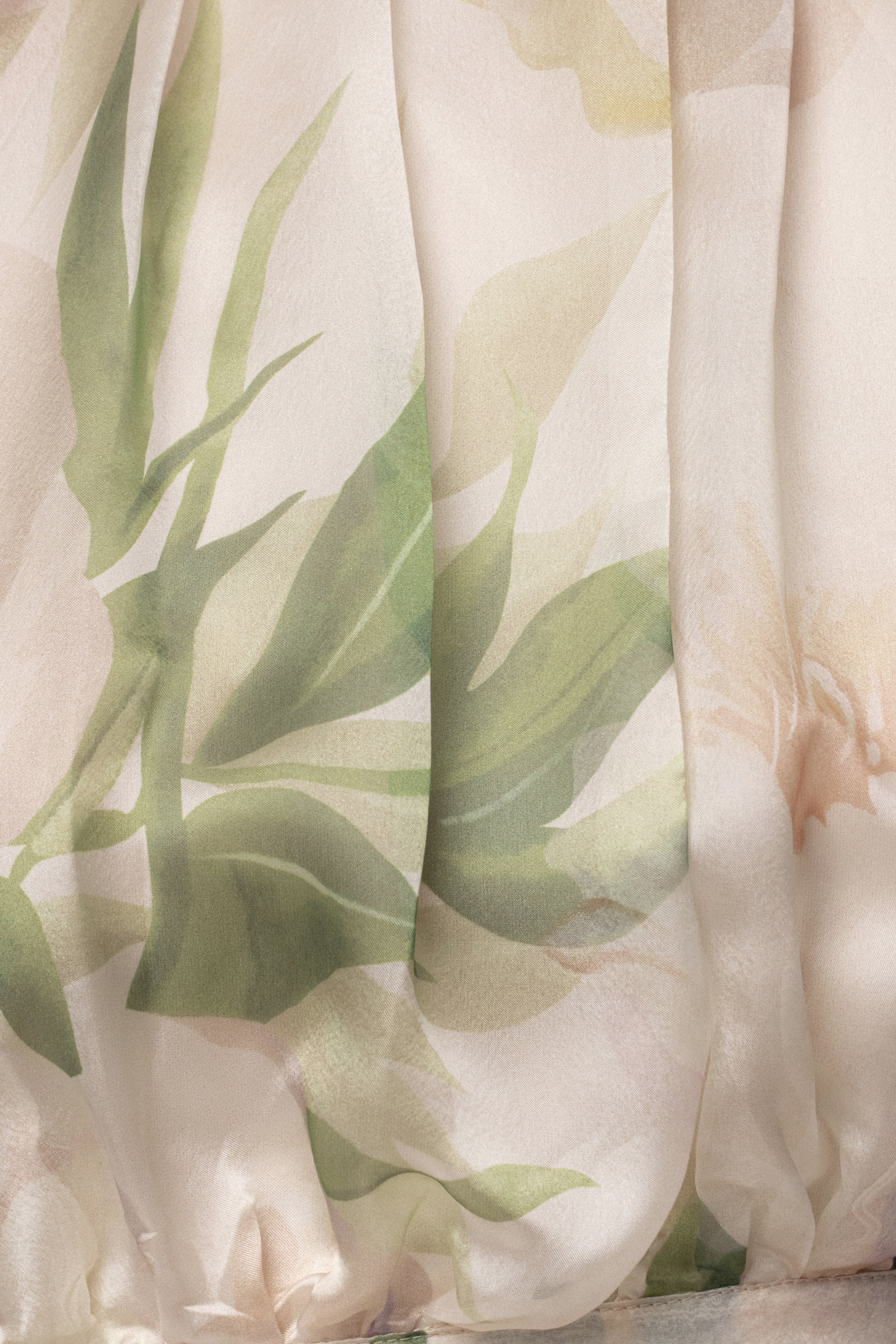Cream Botanical Dreams skirt set by JLUXLABEL, featuring a flowy botanical print skirt and matching top, perfect for summer wear.