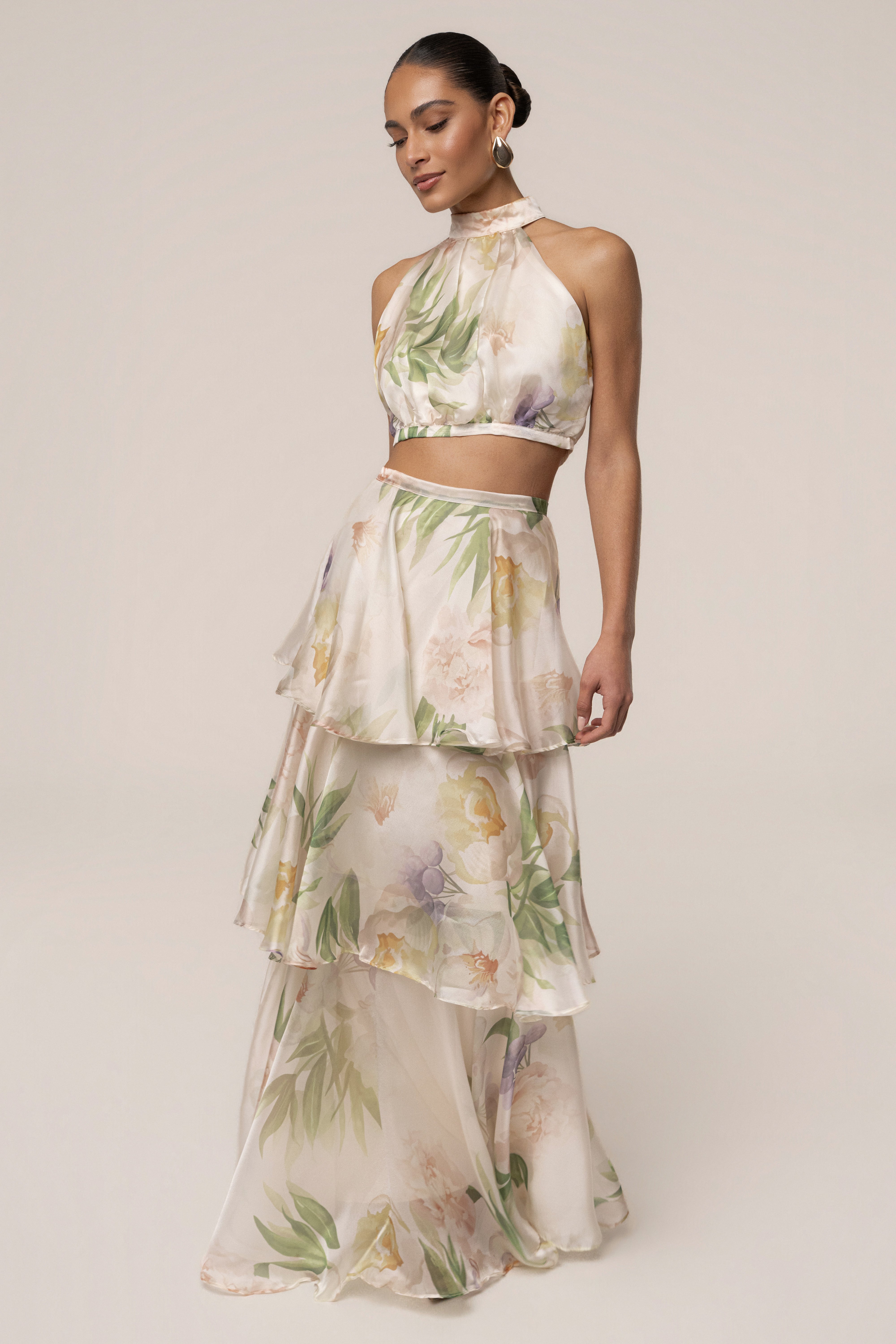 Cream botanical print skirt set by JLUXLABEL featuring a flowy skirt and matching top, perfect for stylish casual wear.