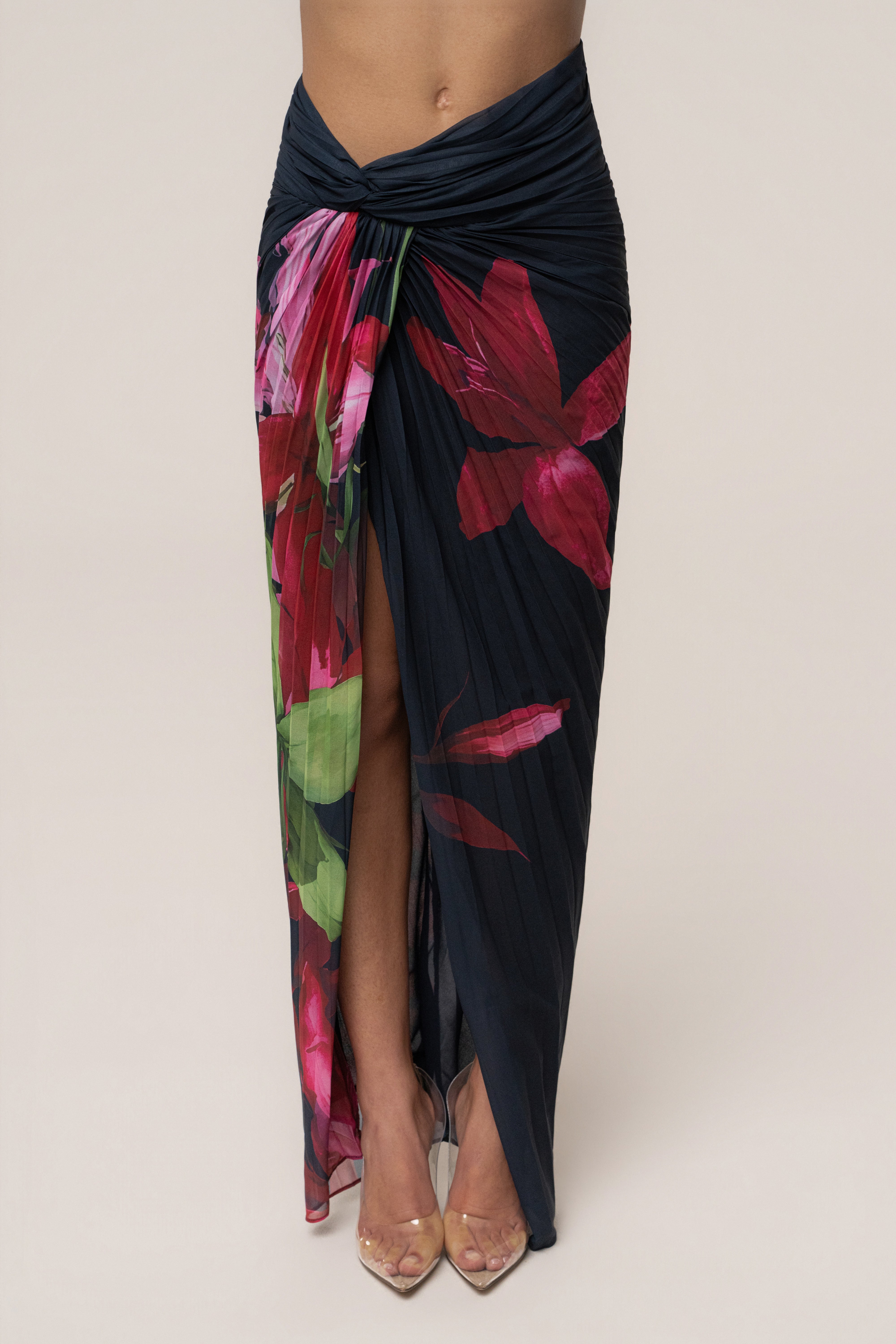 Navy Havana pleat skirt set by JLUXLABEL featuring a pleated skirt and matching top, styled for a chic, coordinated look.