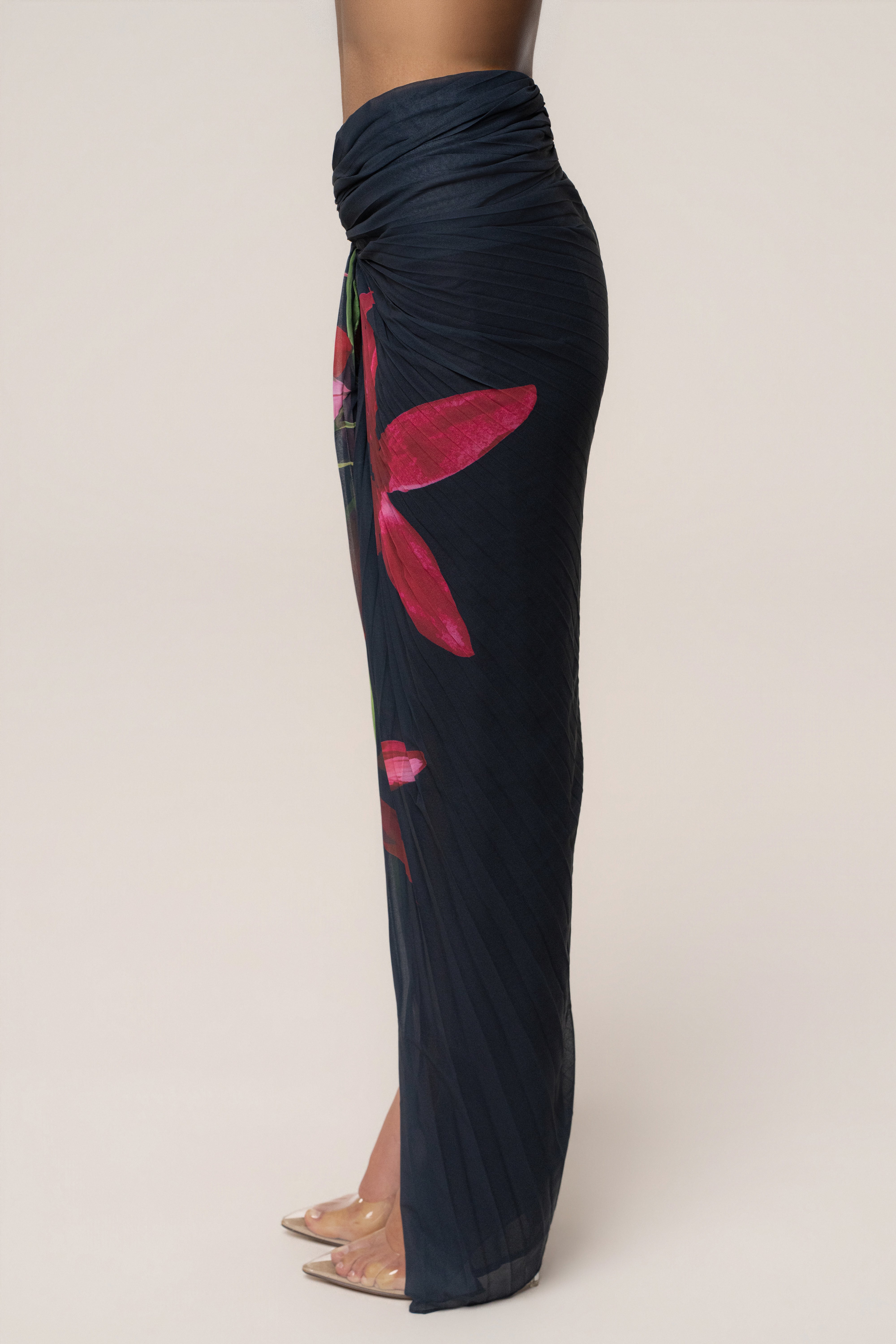 Navy Havana pleat skirt set by JLUXLABEL featuring a stylish pleated skirt and matching top on a model.