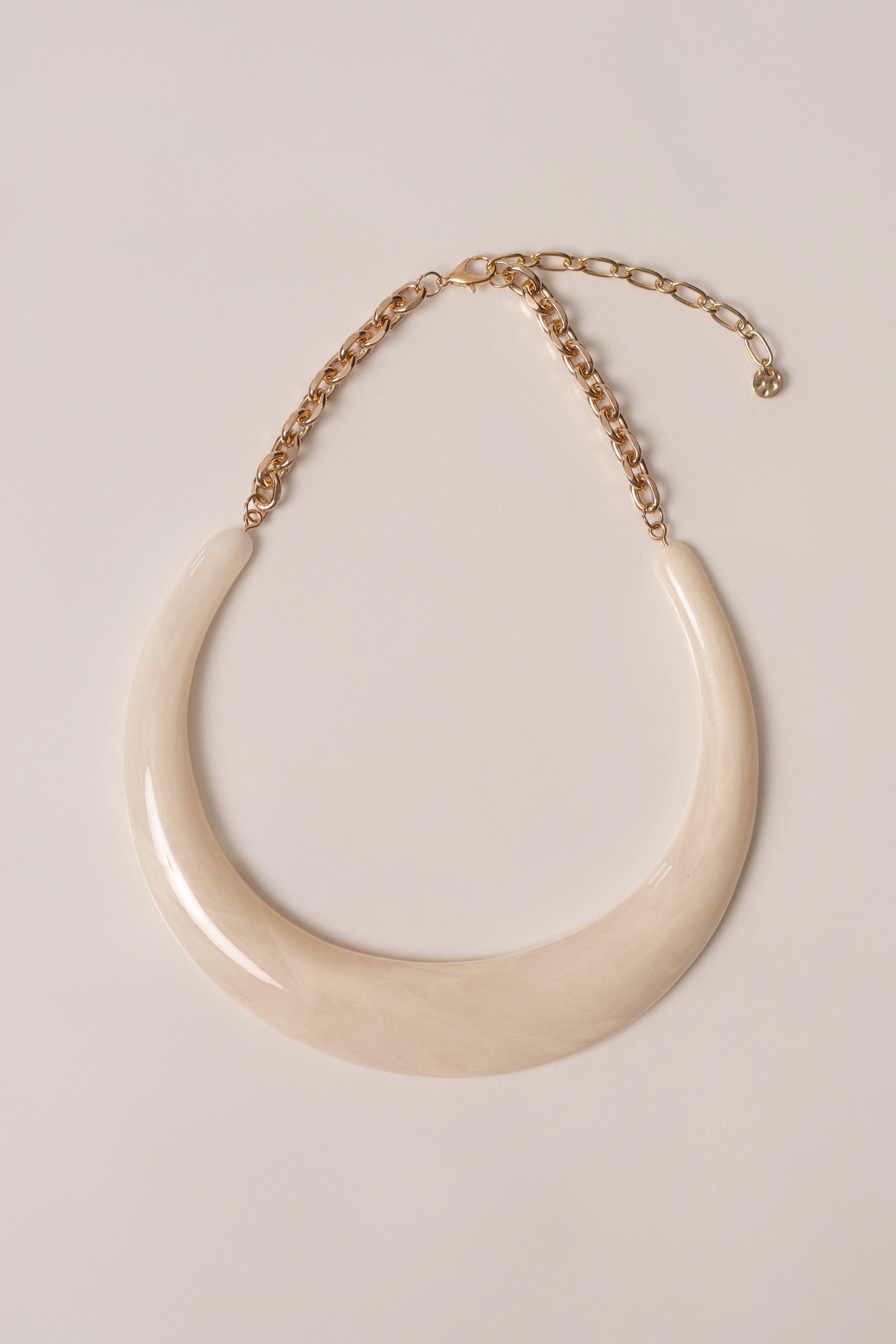 Ivory opaline collar necklace by JLUXLABEL featuring a sleek, elegant jewelry design with smooth, translucent opaline stones.