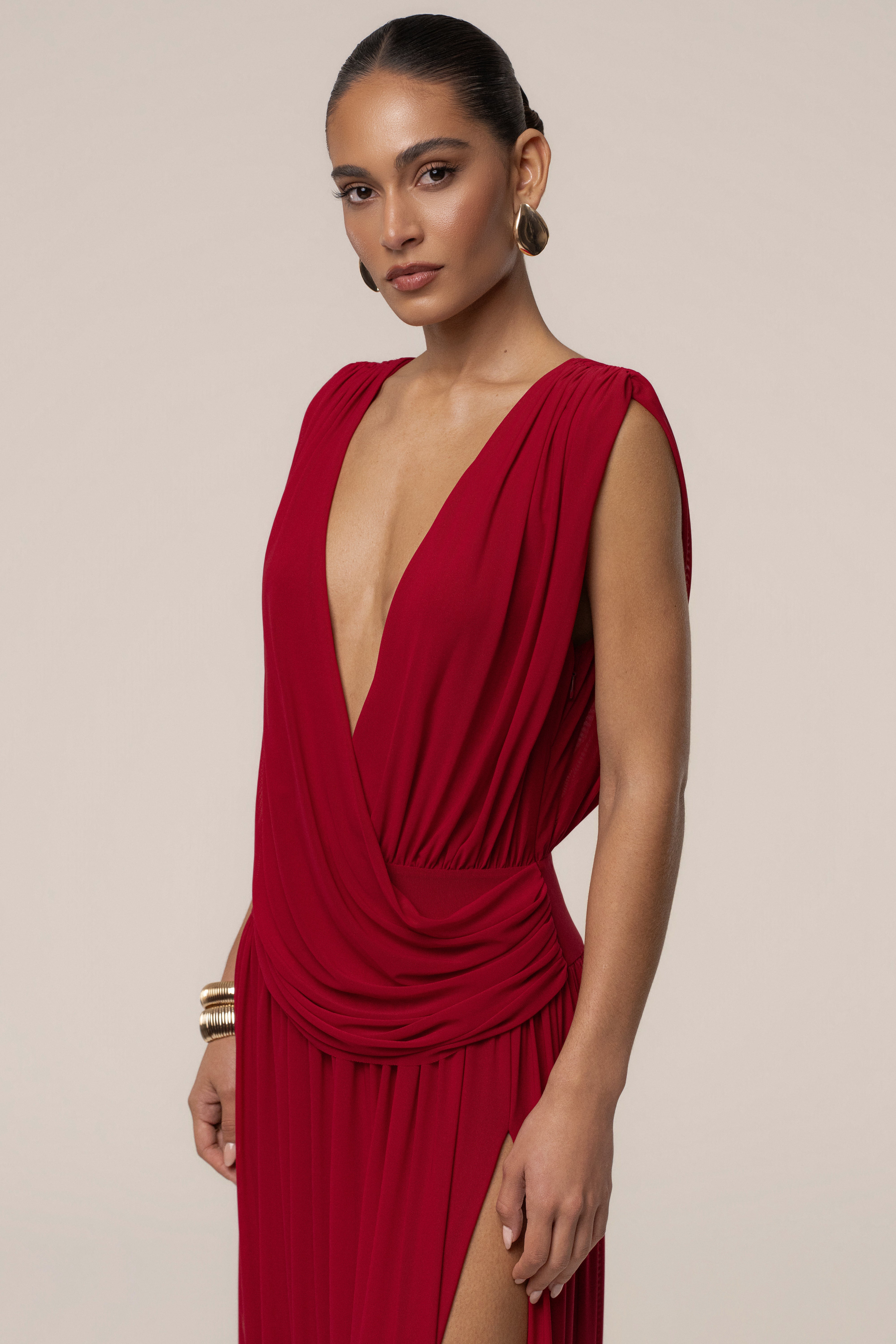 Red evening flow draped maxi dress by JLUXLABEL, showcasing a stylish, elegant dress with flowing fabric and draped details.
