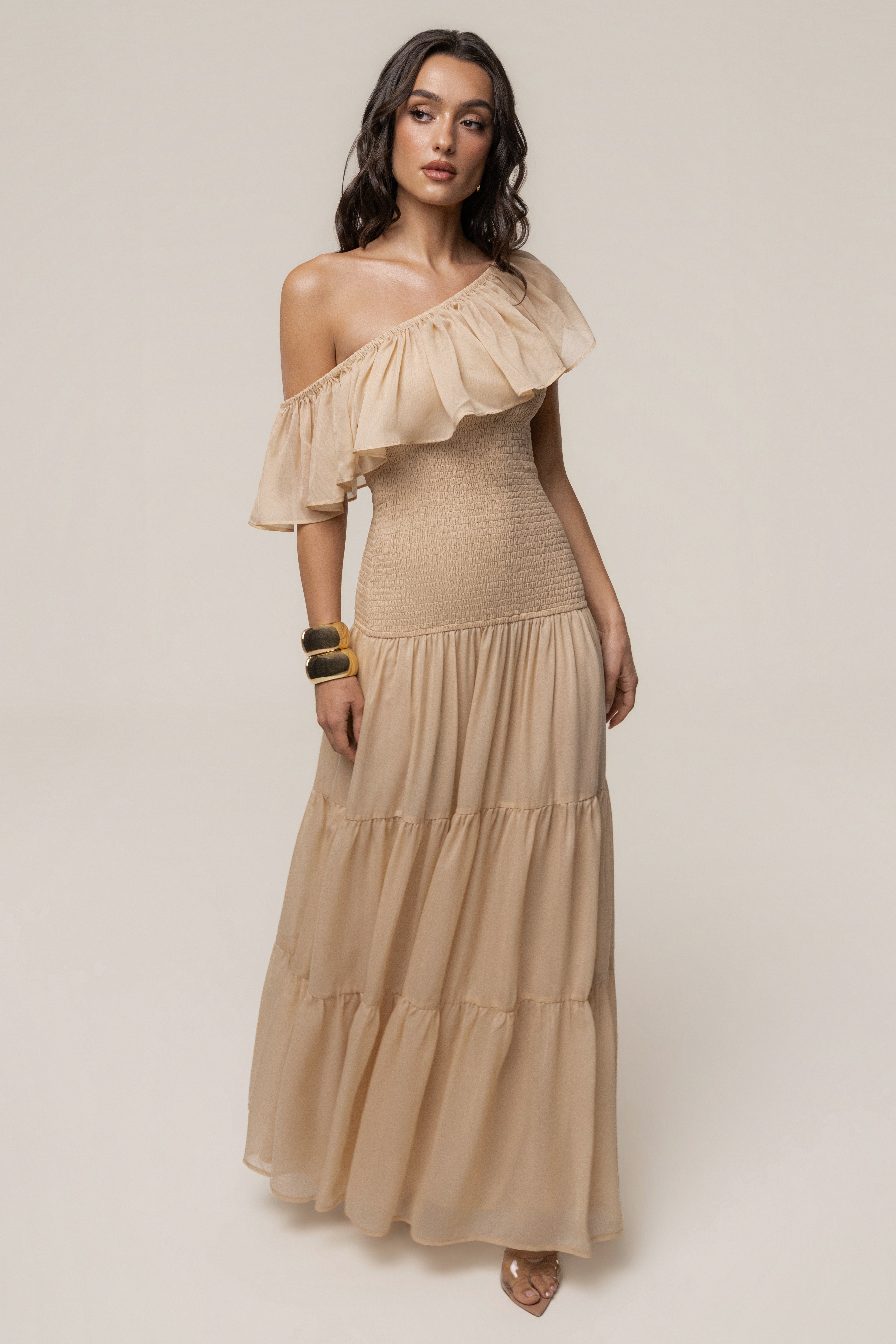 Seaside-inspired white maxi dress with sand-colored accents from JLUXLABEL featuring a flowing drape and beach-ready style.