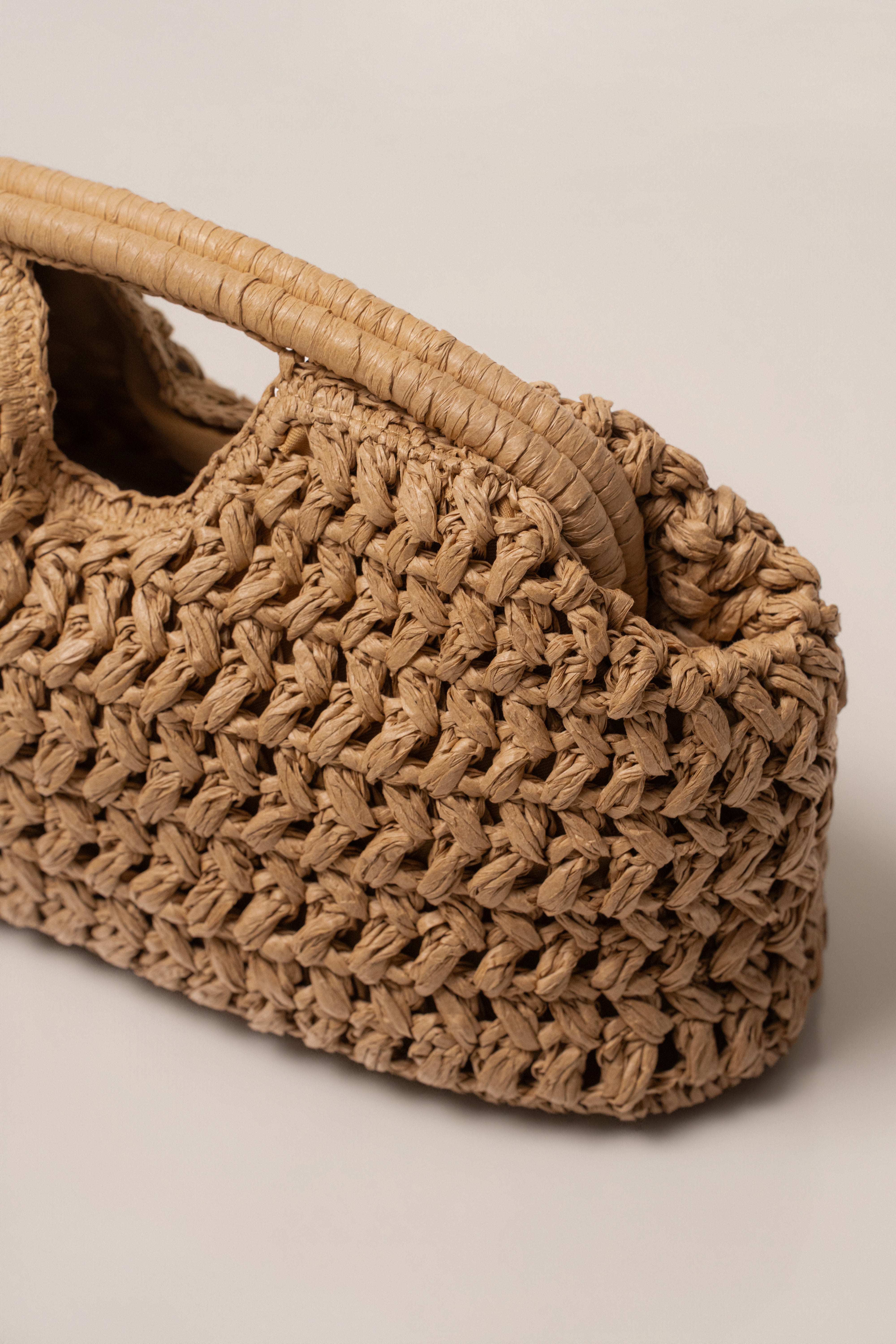 JLUXLABEL Natural Casa Sol straw bag, eco-friendly accessories with woven design, perfect for casual summer outfits.