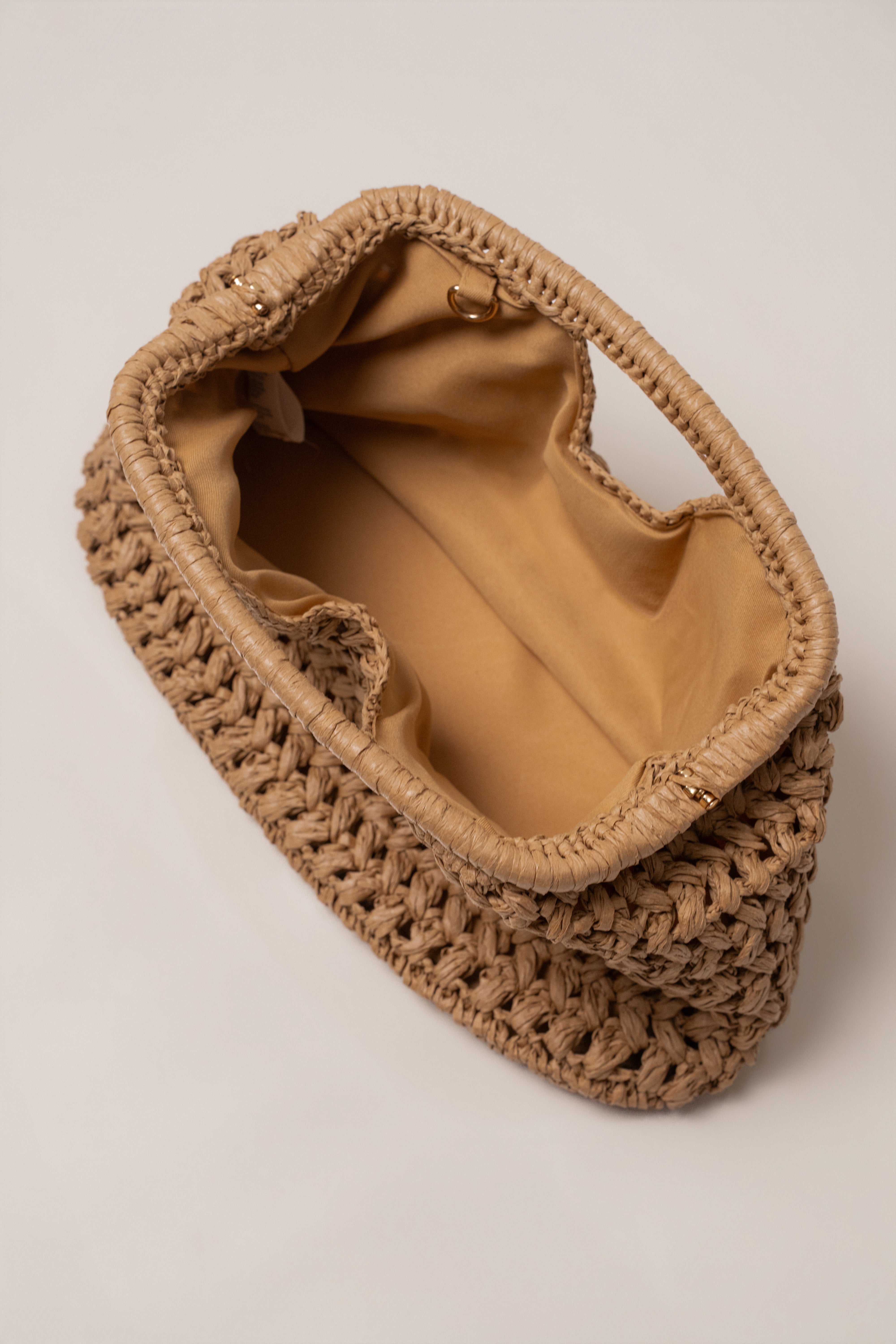 Natural Casa Sol straw bag by JLUXLABEL featuring woven straw material with leather handles and boho-inspired design.