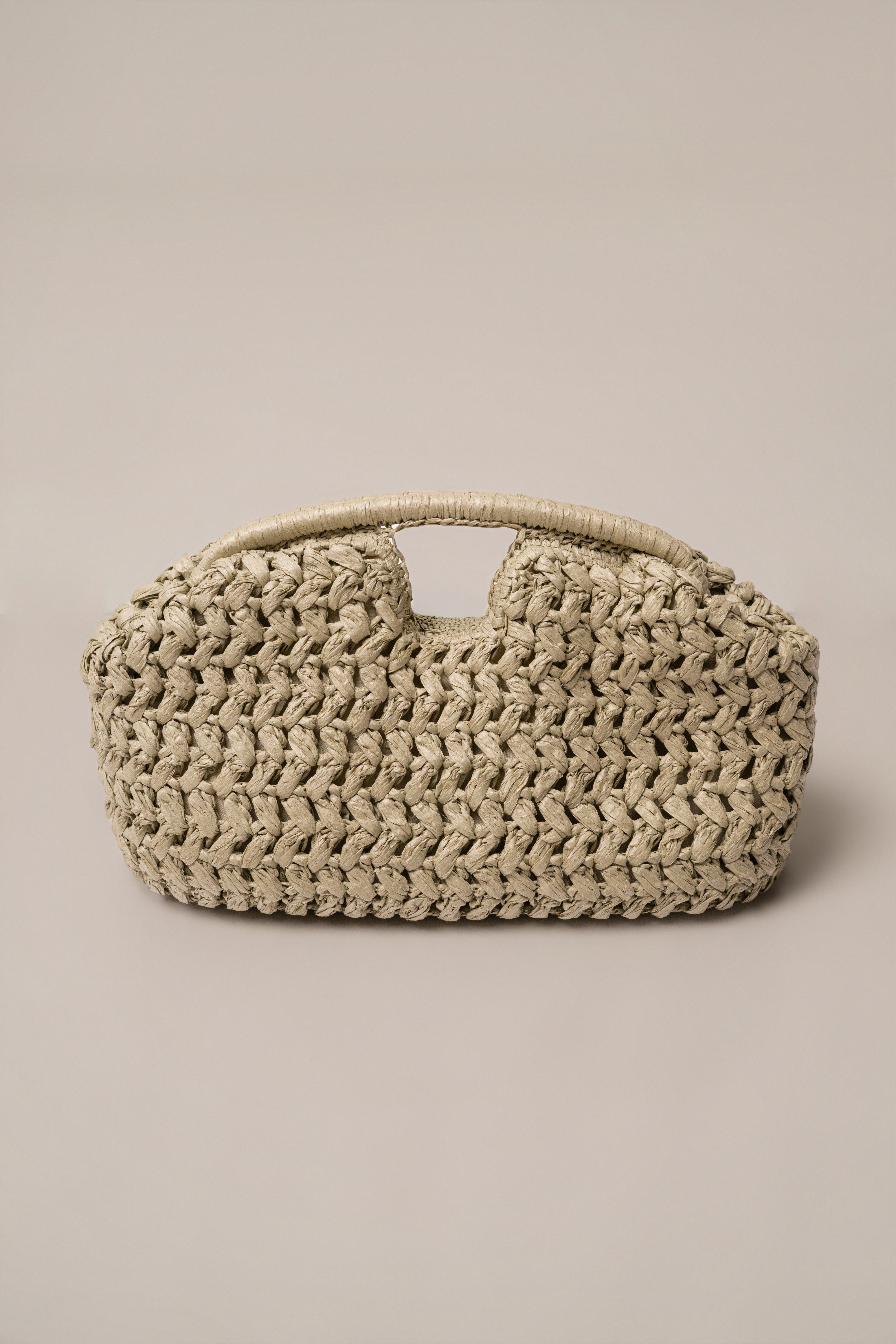 JLUXLABEL Sage Casa Sol straw bag with woven design, perfect for casual accessories and summer style.