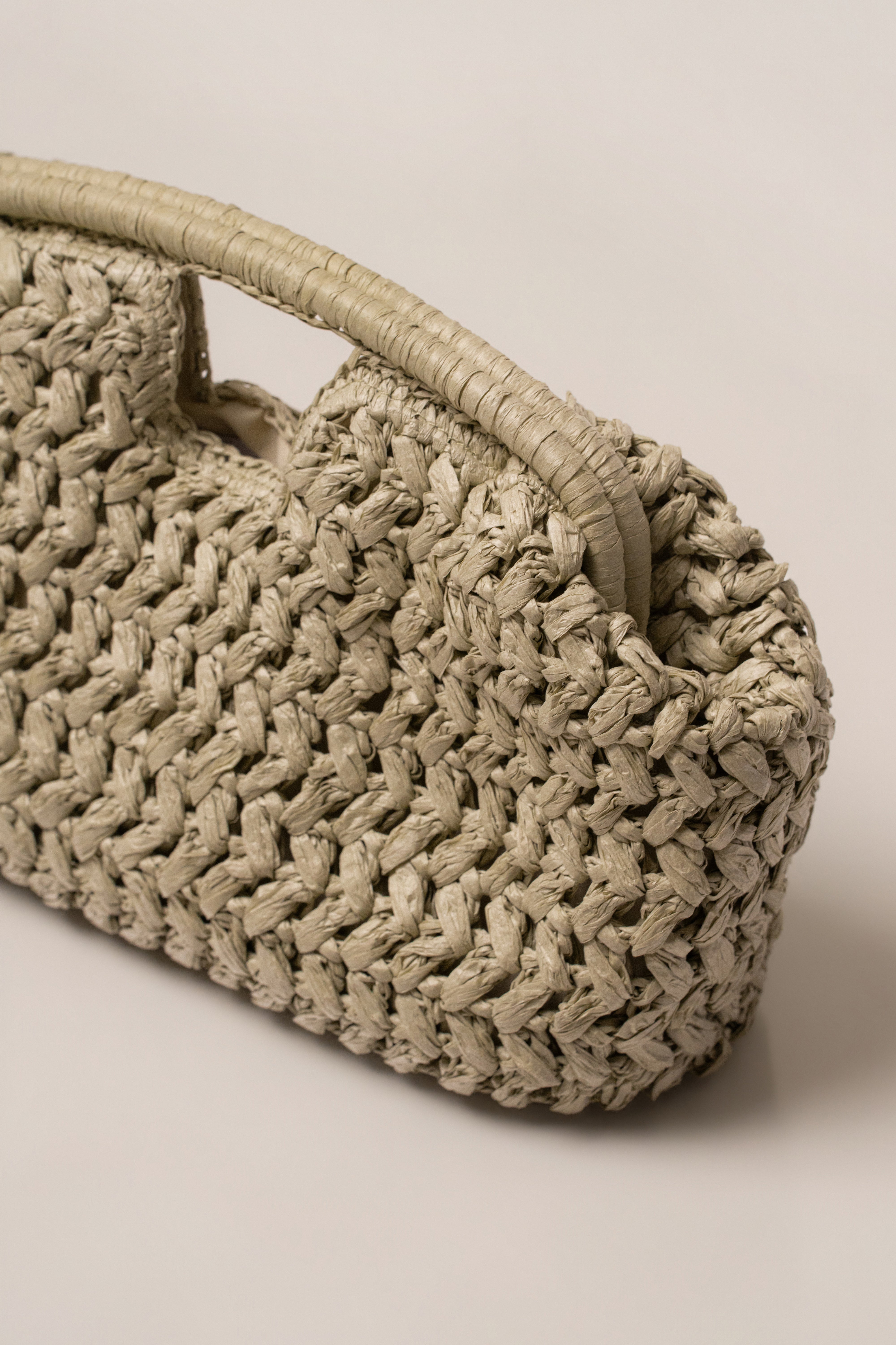 Sage Casa Sol straw bag by JLUXLABEL, stylish accessories with woven straw design and shoulder strap, perfect for casual outings.