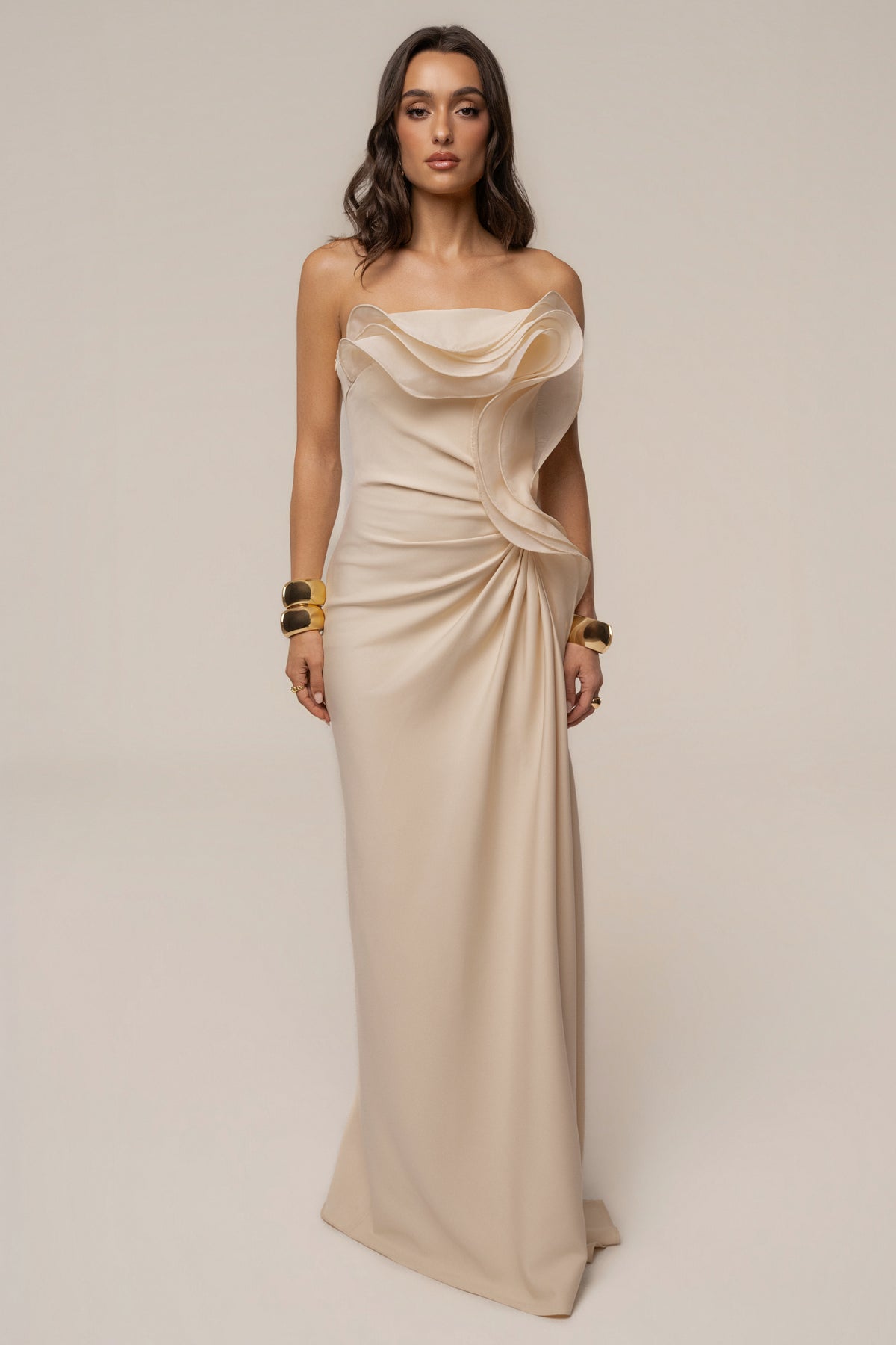 Ivory Main Event Maxi Dress by JLUXLABEL featuring elegant flowy fabric and sleeveless design, perfect for formal occasions.