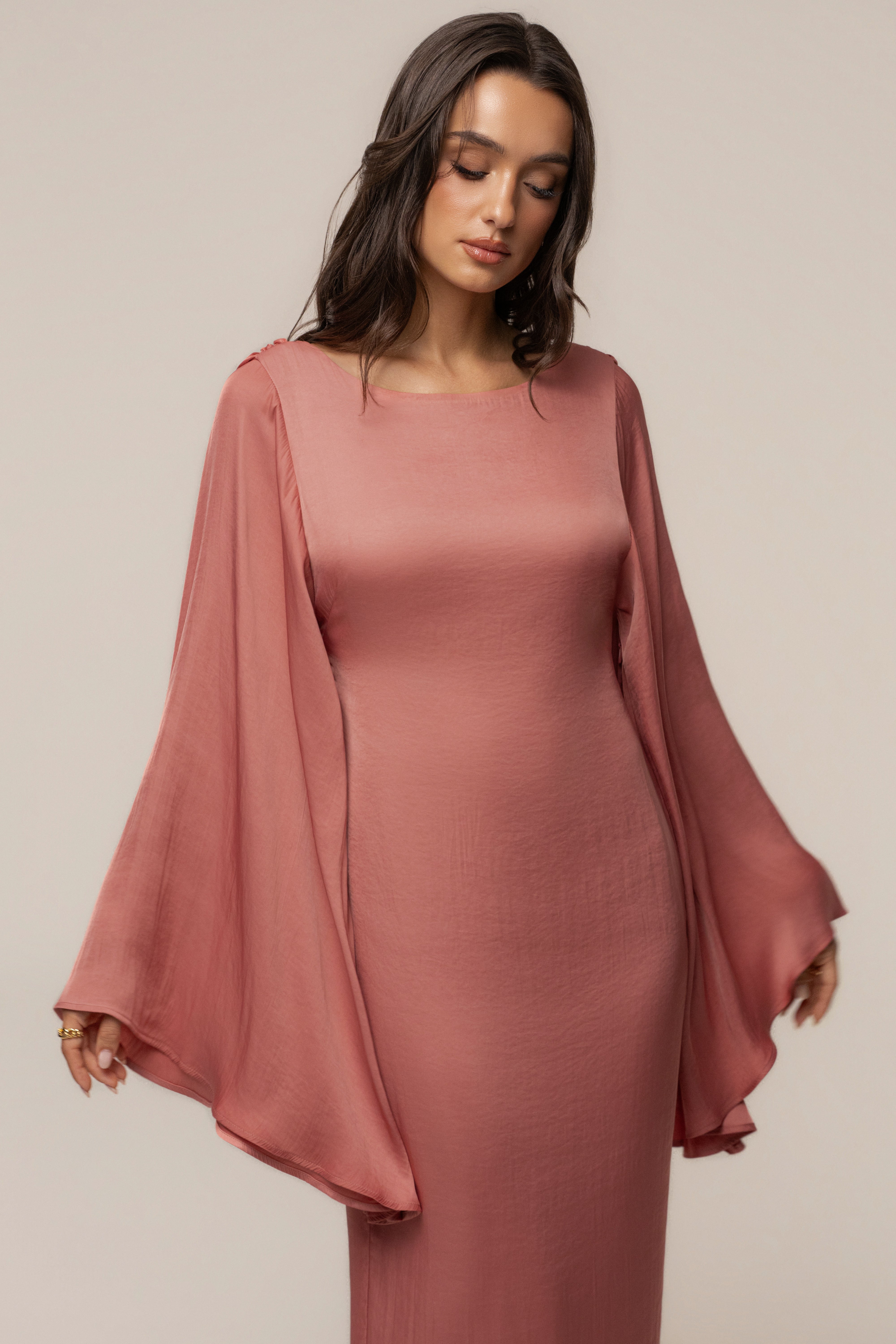 Peach soft maxi dress by JLUXLABEL with flowing fabric and sleeveless design, perfect for summer or casual occasions.