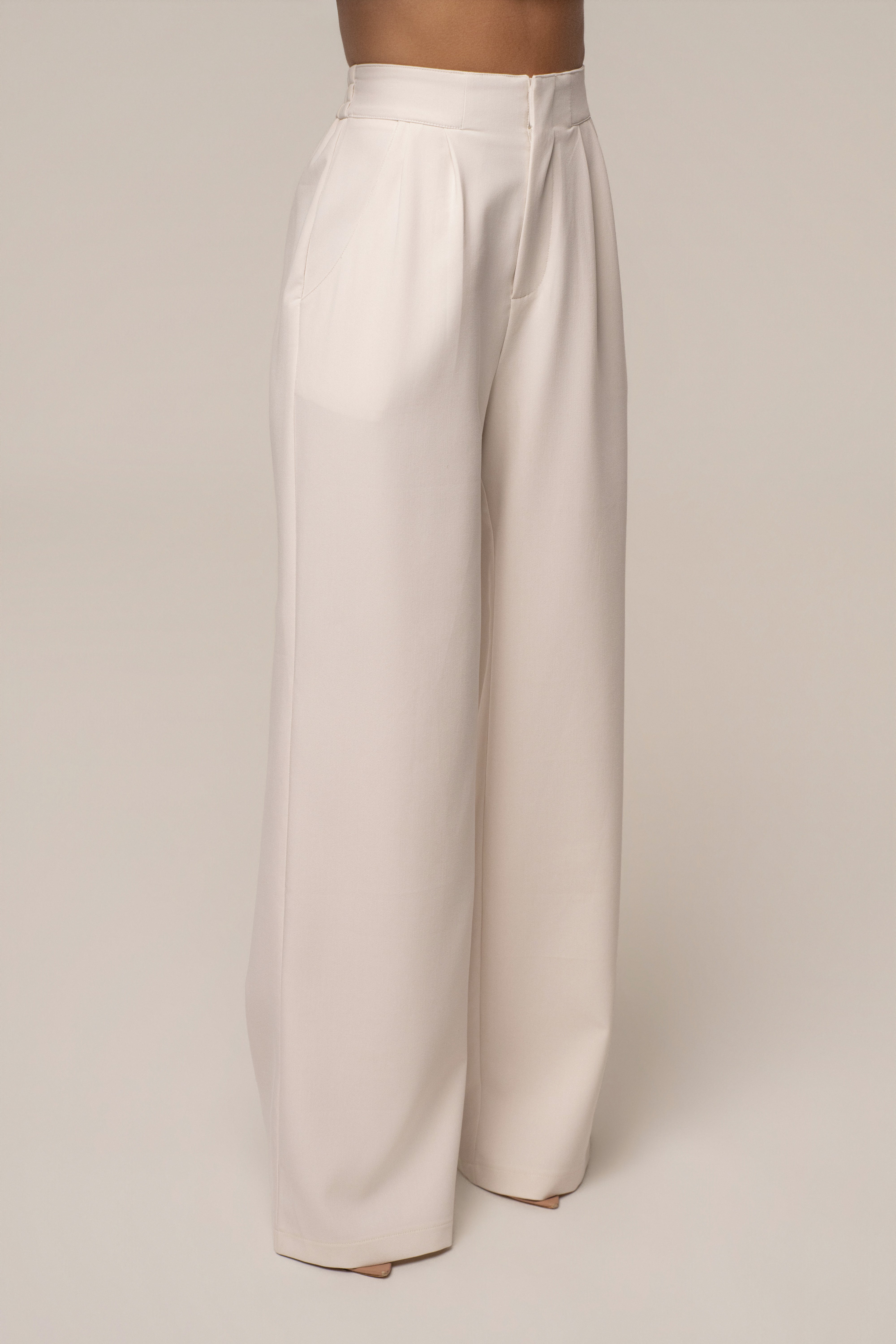 Ivory JLUXLABEL tailored trousers for women, stylish and fitted bottoms with a sleek, professional look.