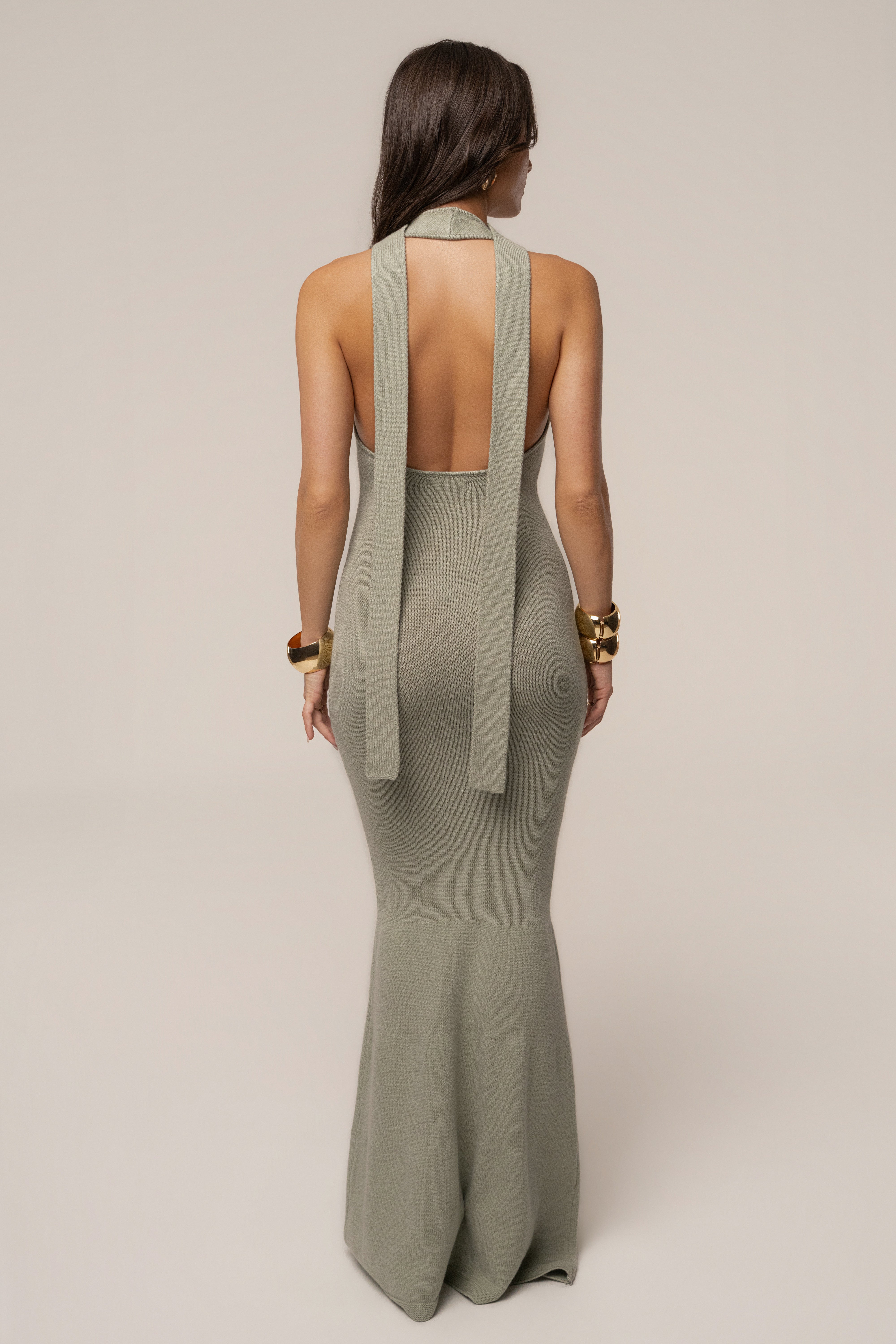 Sage Serenity Coast Maxi Dress by JLUXLABEL featuring flowing fabric and a relaxed, elegant silhouette.