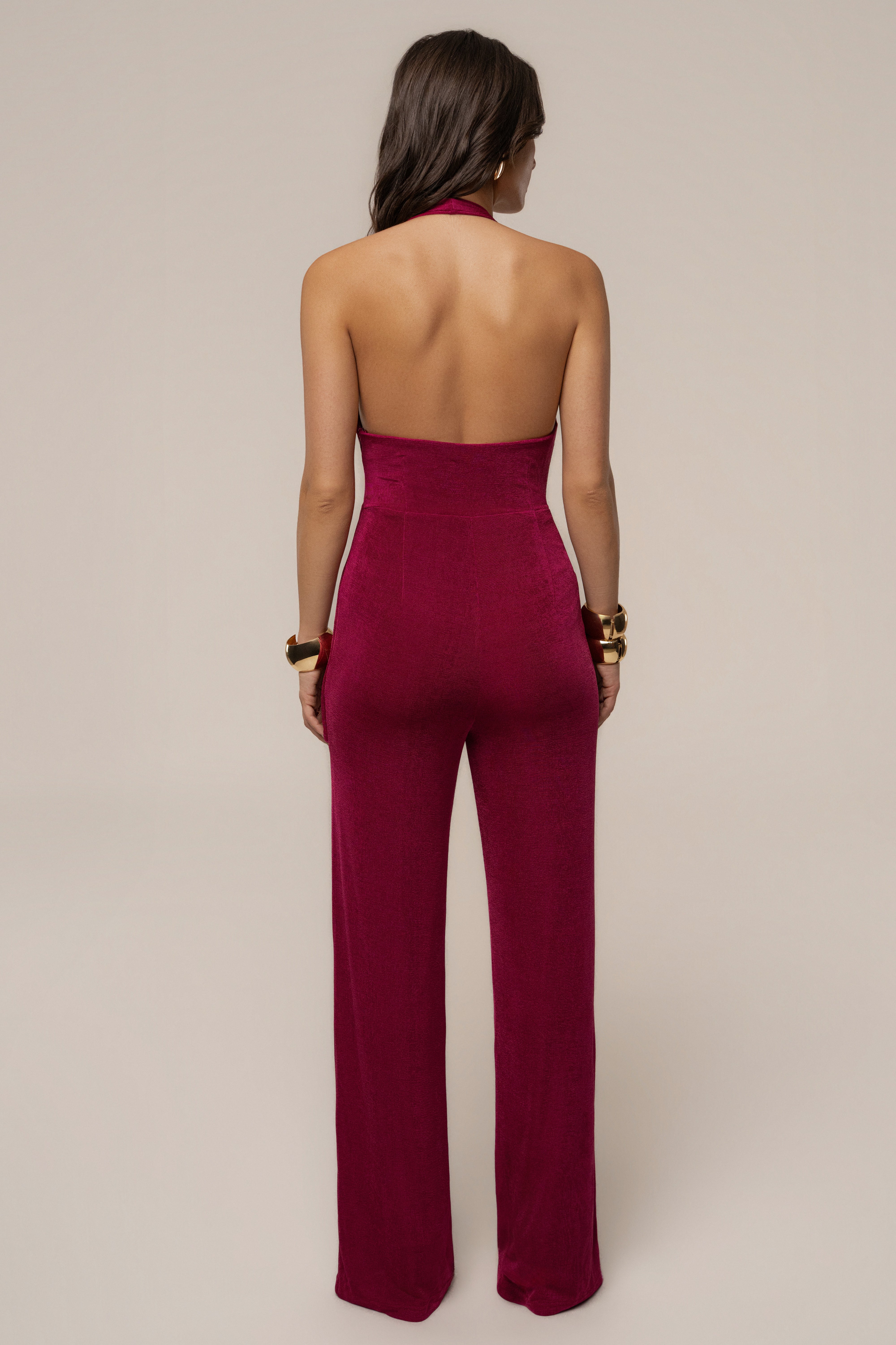 Fuchsia rustic charm halter jumpsuit by JLUXLABEL featuring a fitted bodice and wide-leg pants, displayed on a mannequin.