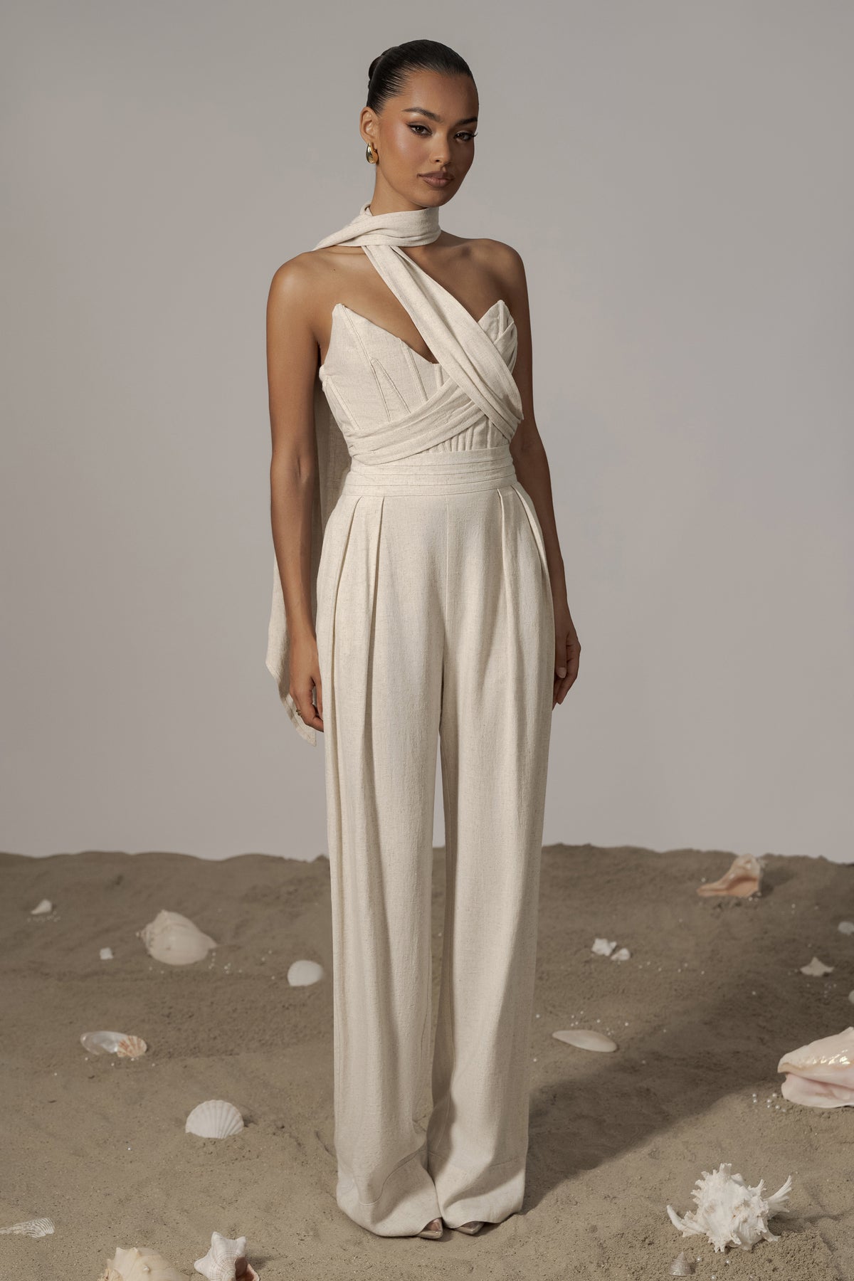 Natural Villa Views Linen Trousers by JLUXLABEL, off-shore color, lightweight, relaxed fit, with a wide-leg design and natural linen fabric.