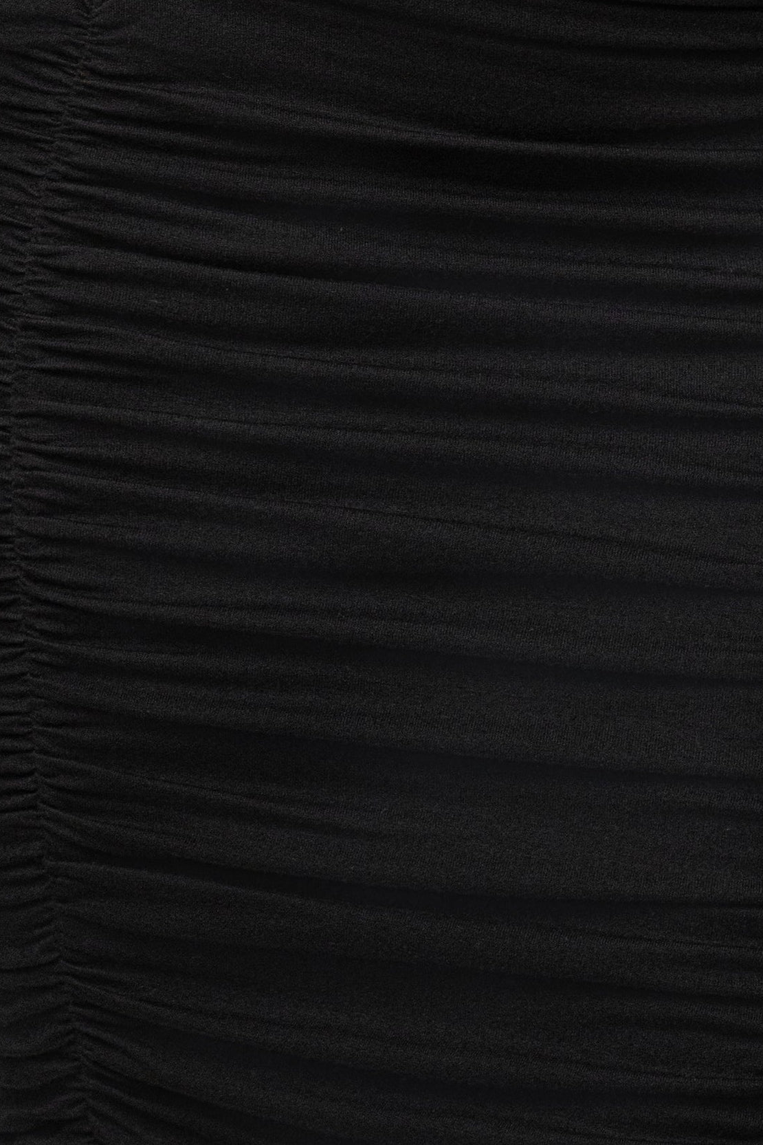 Black Go The Distance skirt set by JLUXLABEL, featuring a stylish matching top and skirt ensemble displayed on a model.