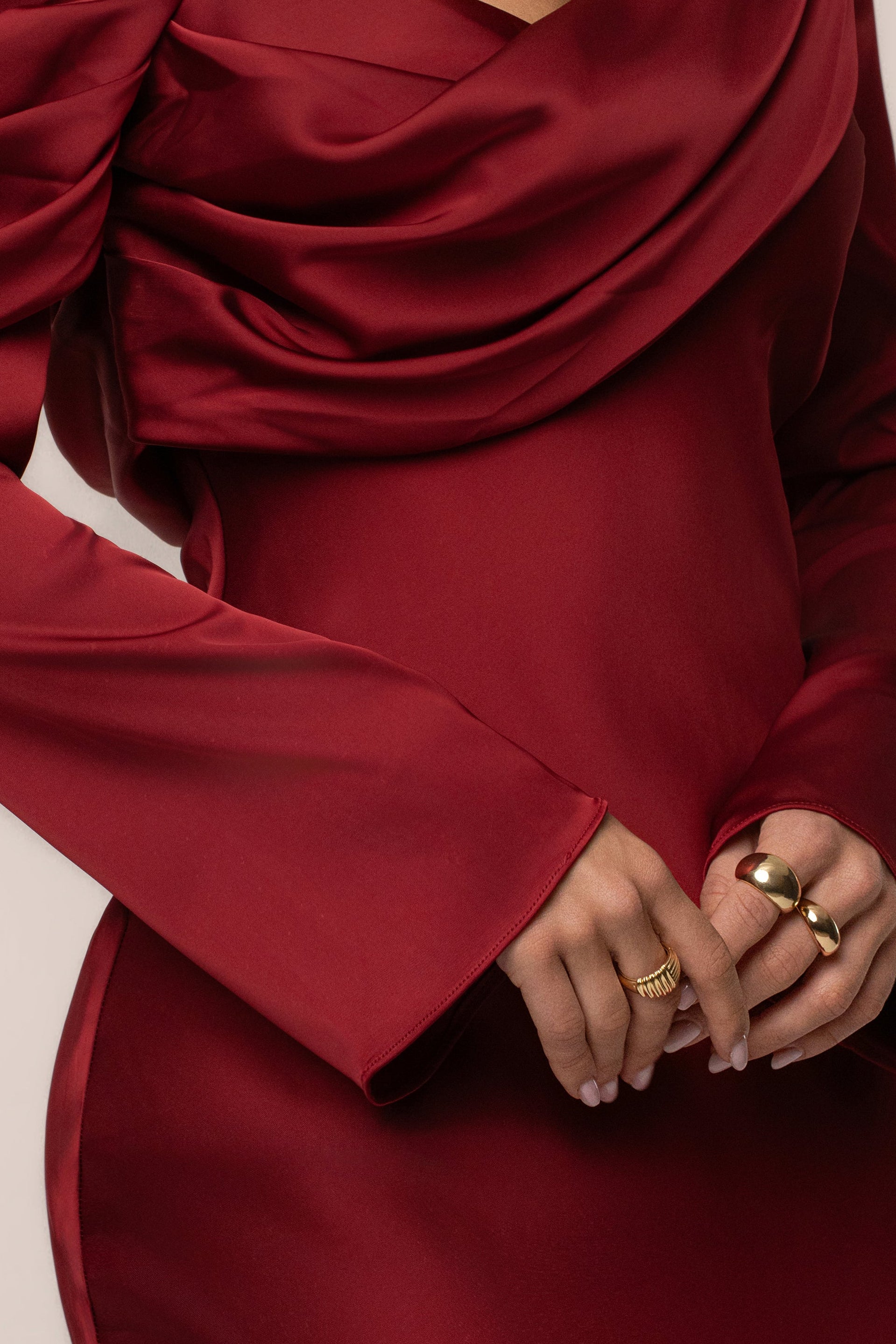 Red satin dress by JLUXLABEL, featuring a sleek, elegant design with flowing fabric and a fitted silhouette.