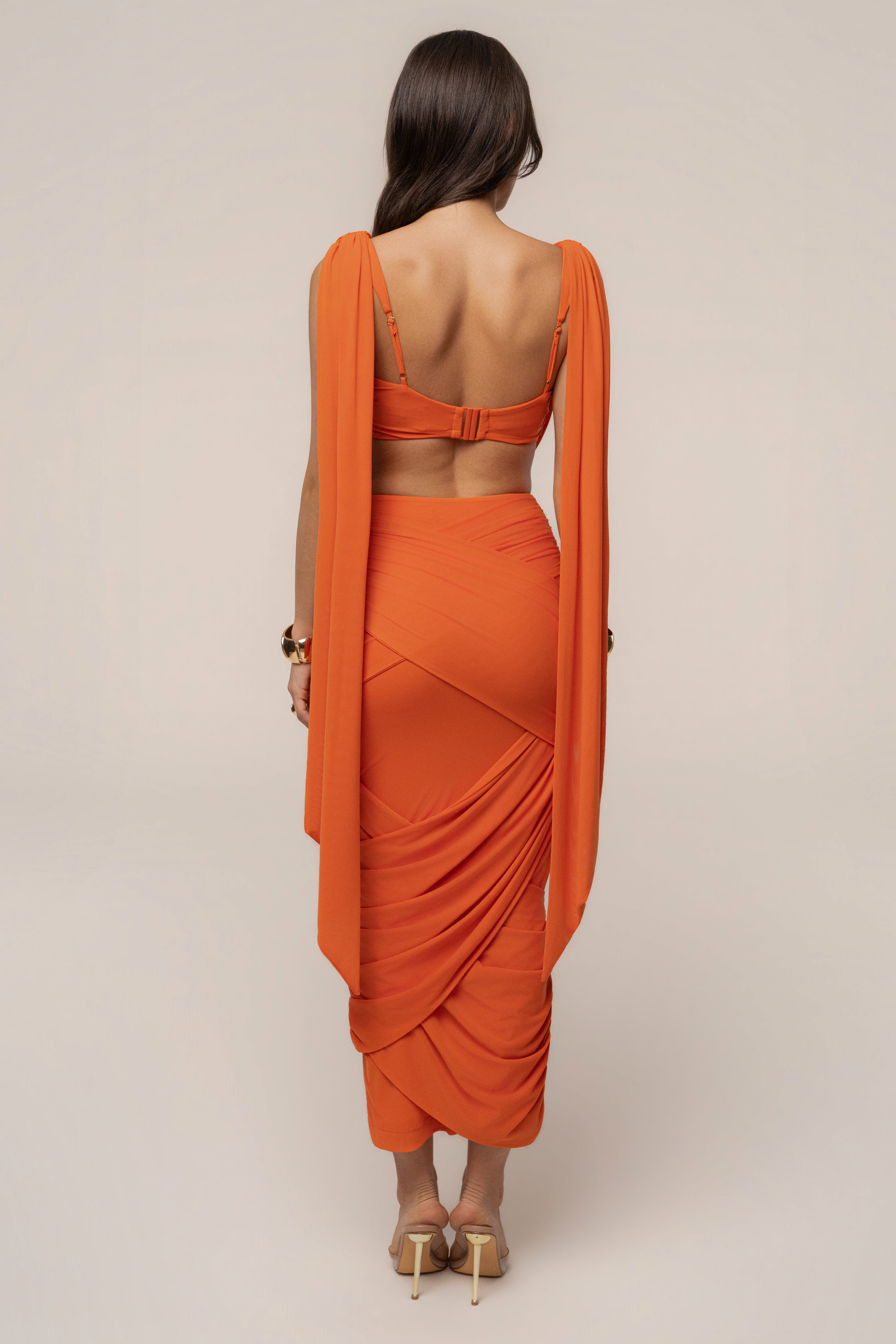 Orange Divine Drape Mesh Skirt Set by JLUXLABEL featuring a flowing mesh skirt and matching top, perfect for stylish occasions.