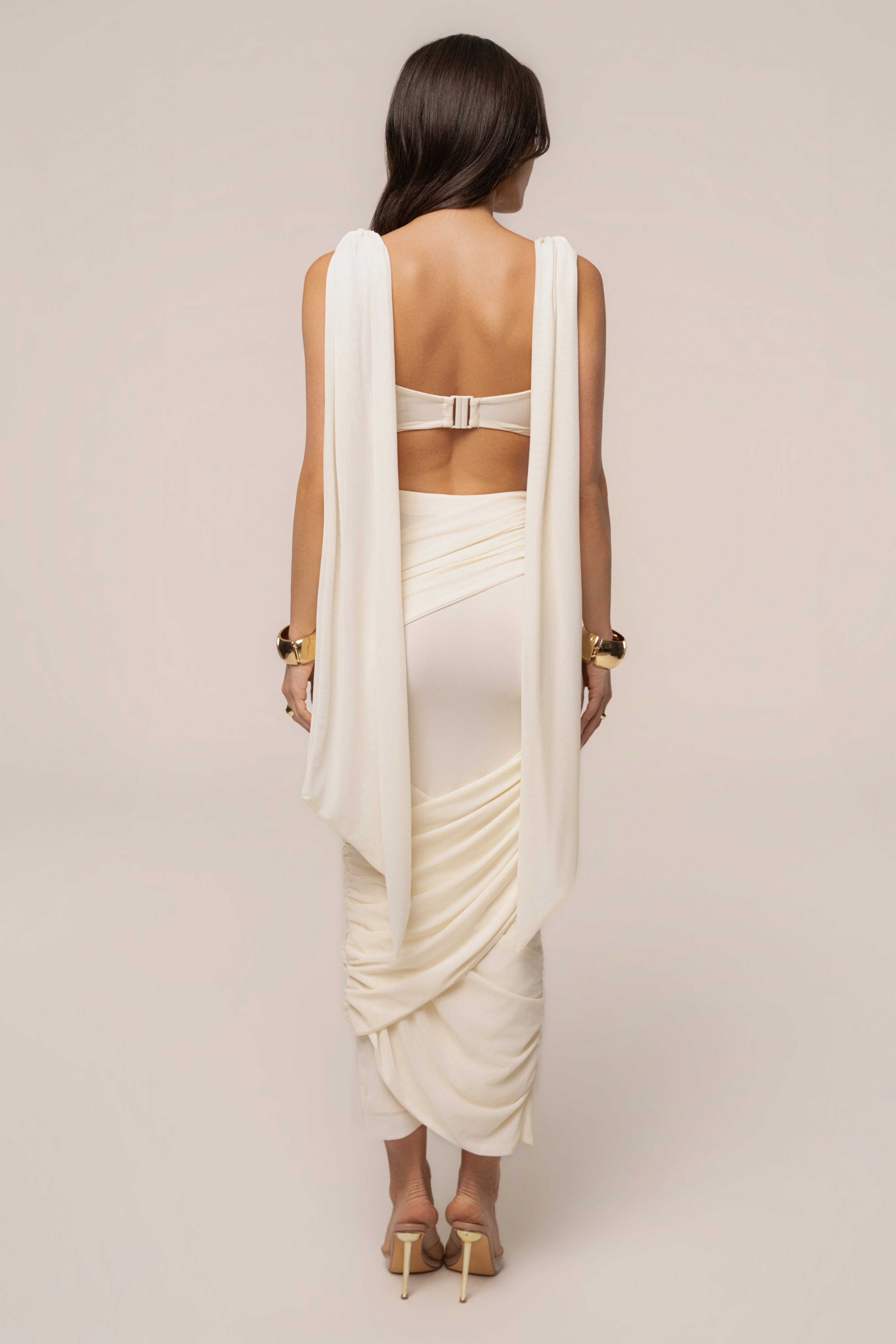 Ivory Divine Drape Mesh Skirt Set by JLUXLABEL featuring a flowing skirt and matching top with elegant drape details.