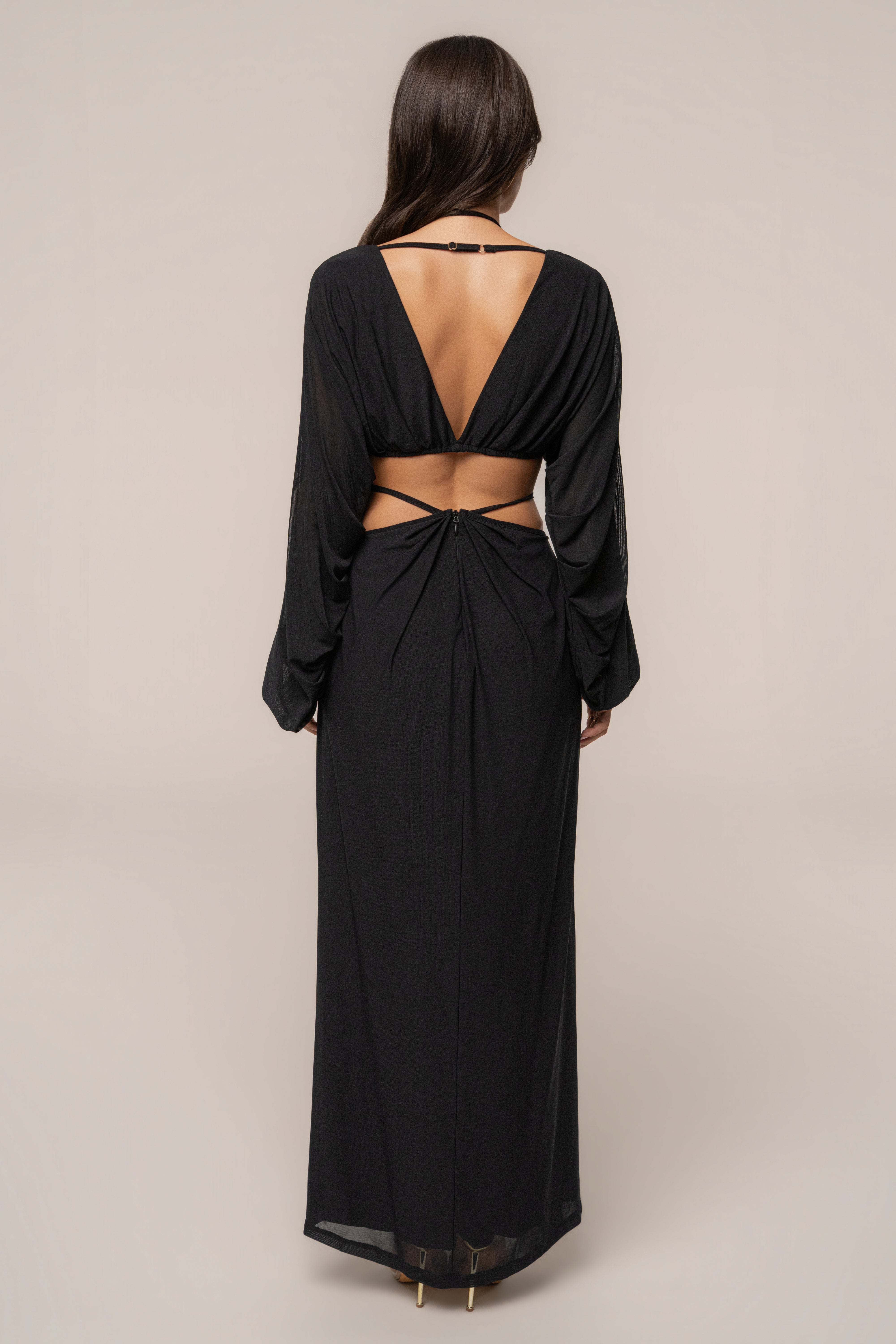 Black Hera Draped Maxi Skirt by JLUXLABEL featuring flowing fabric and elegant draping, styled as a stylish women's bottoms.