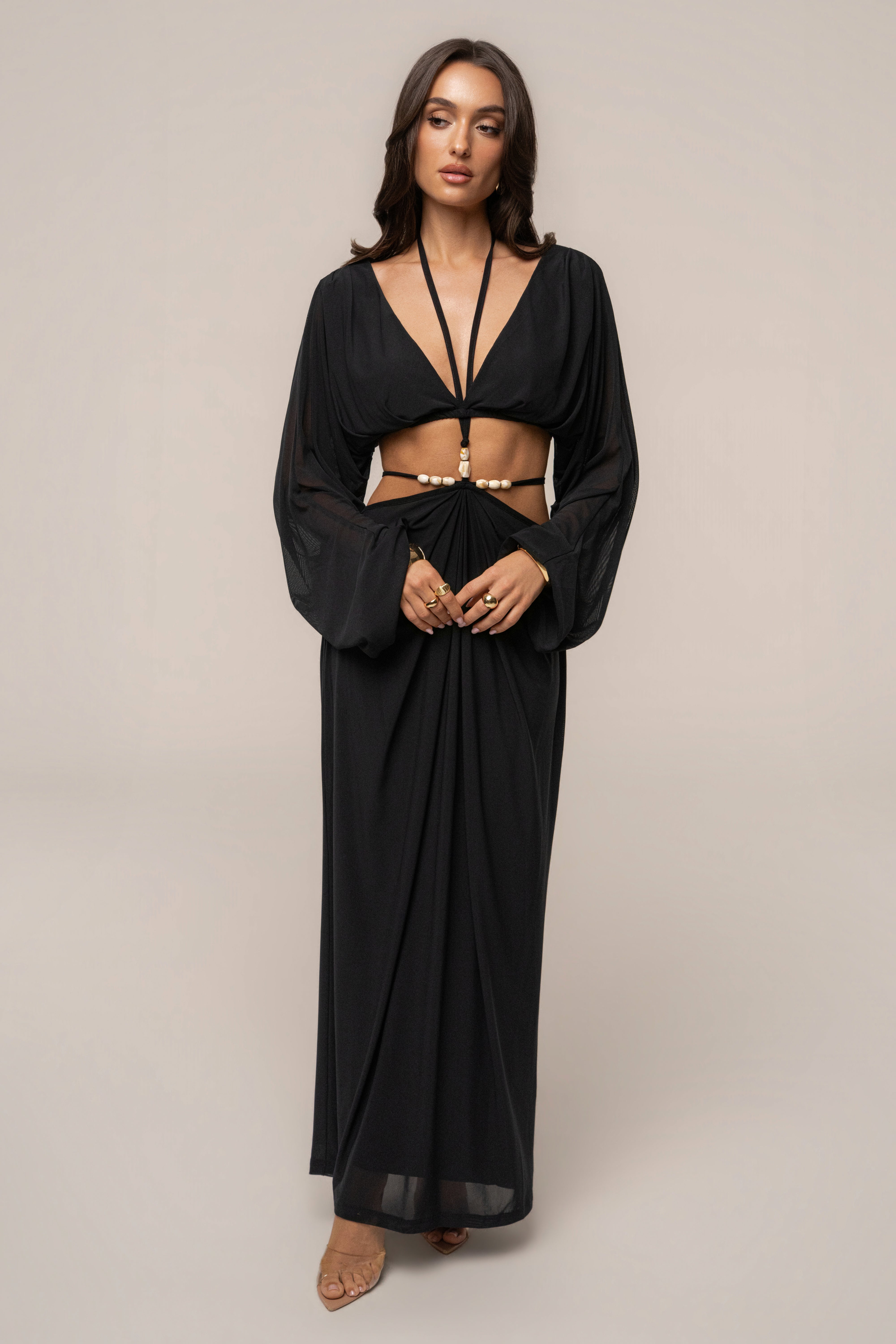 Black Hera Draped Maxi Skirt by JLUXLABEL, flowing black maxi skirt with draped design, styled as a stylish bottoms piece.