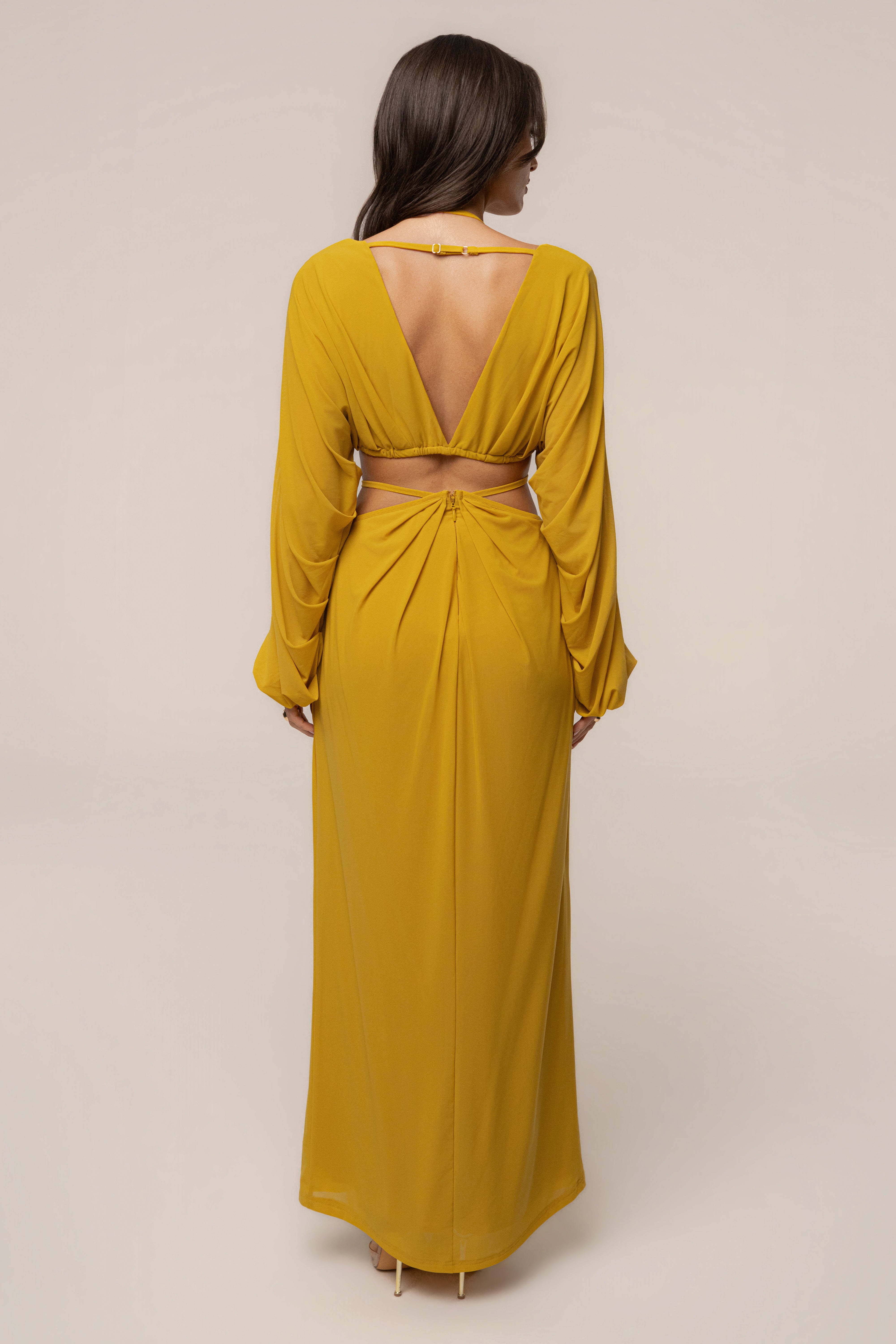 Mustard Selene Draped Top by JLUXLABEL, stylish women's top with draped design and flowing fabric, shown on a model.