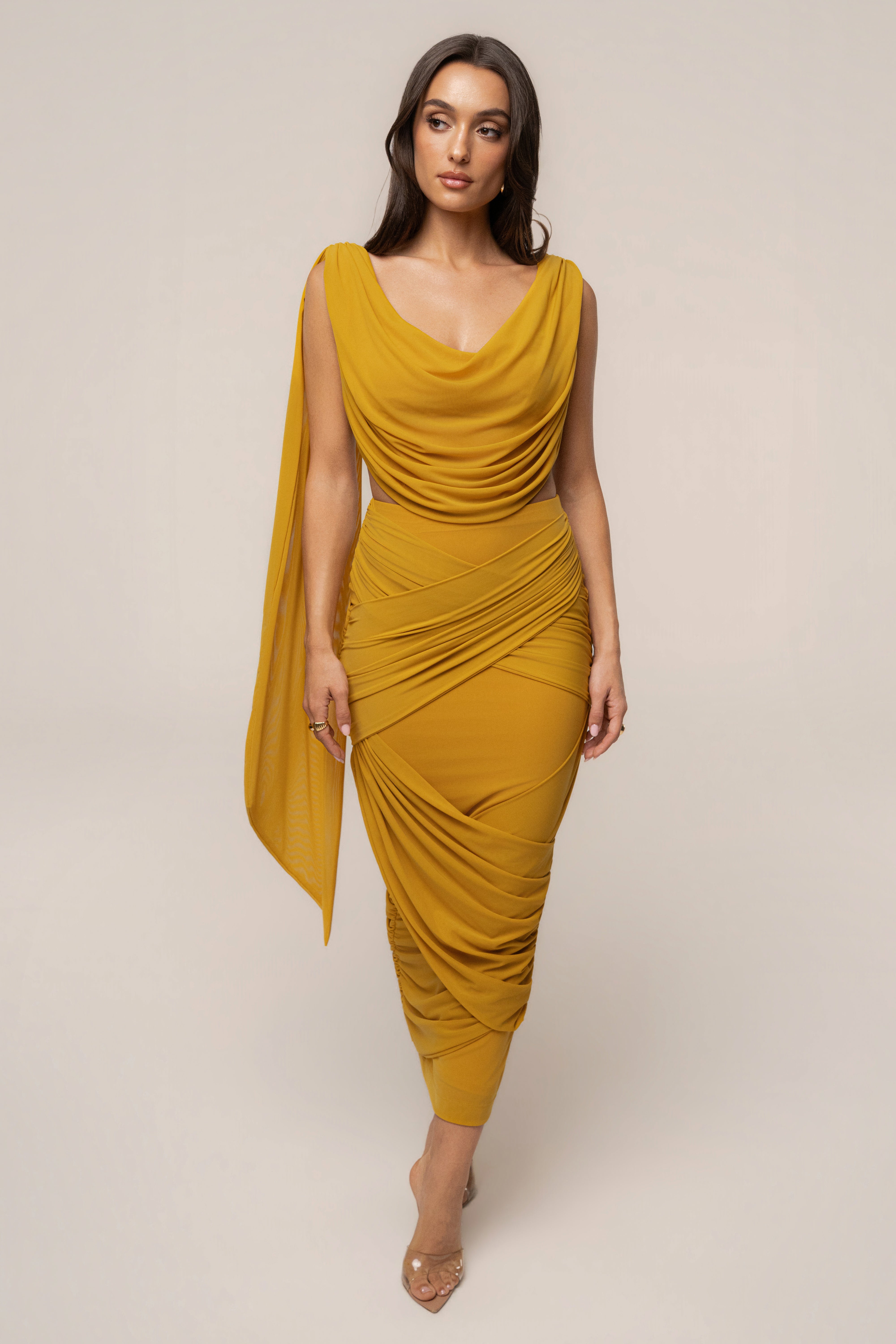 Yellow Divine Drape Mesh Skirt Set by JLUXLABEL featuring a stylish mesh skirt and matching top, perfect for trendy fashion looks.