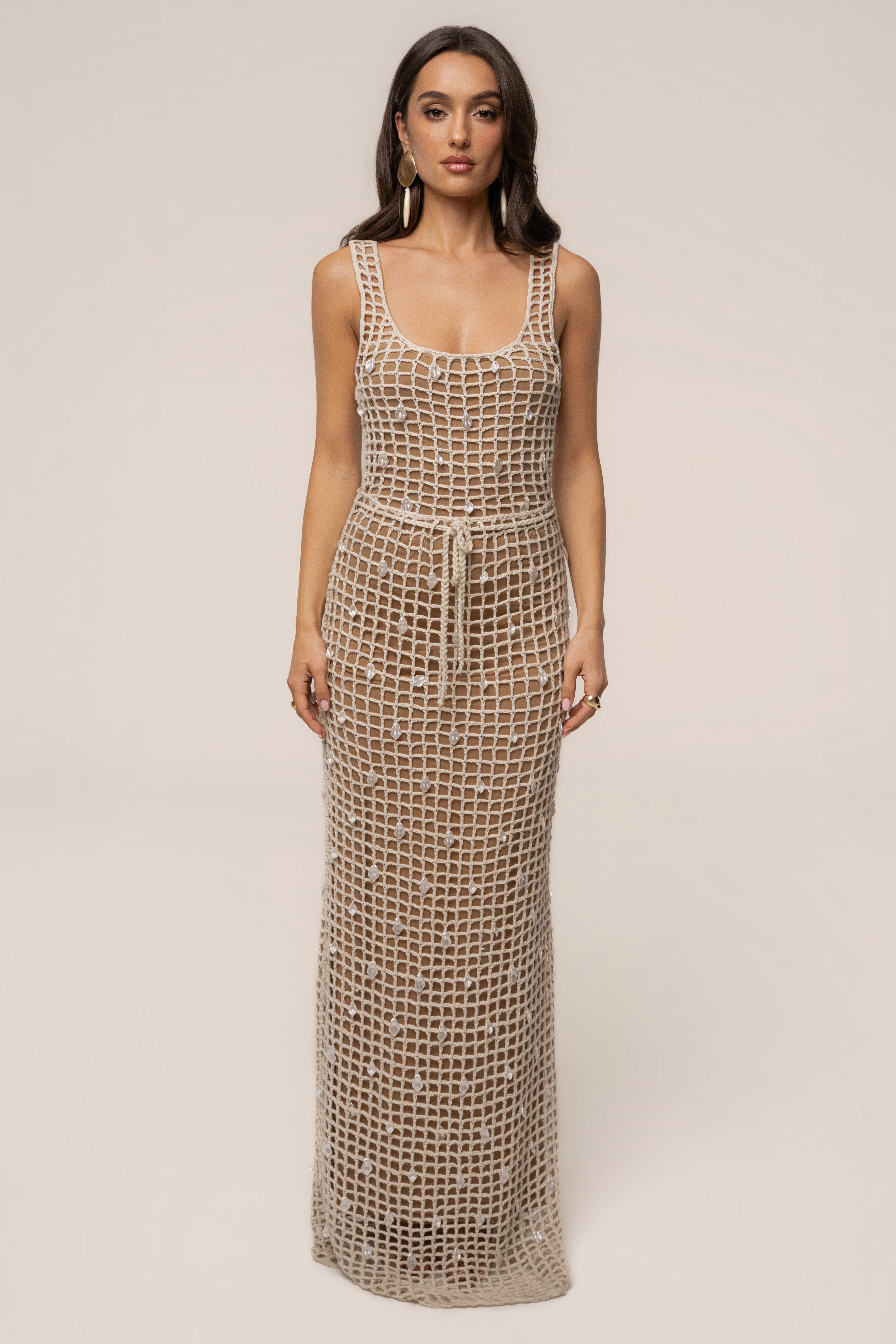 Ecru Pearl Shore crochet skirt by JLUXLABEL, featuring intricate crochet design and pearl accents, styled as a stylish women's bottoms.
