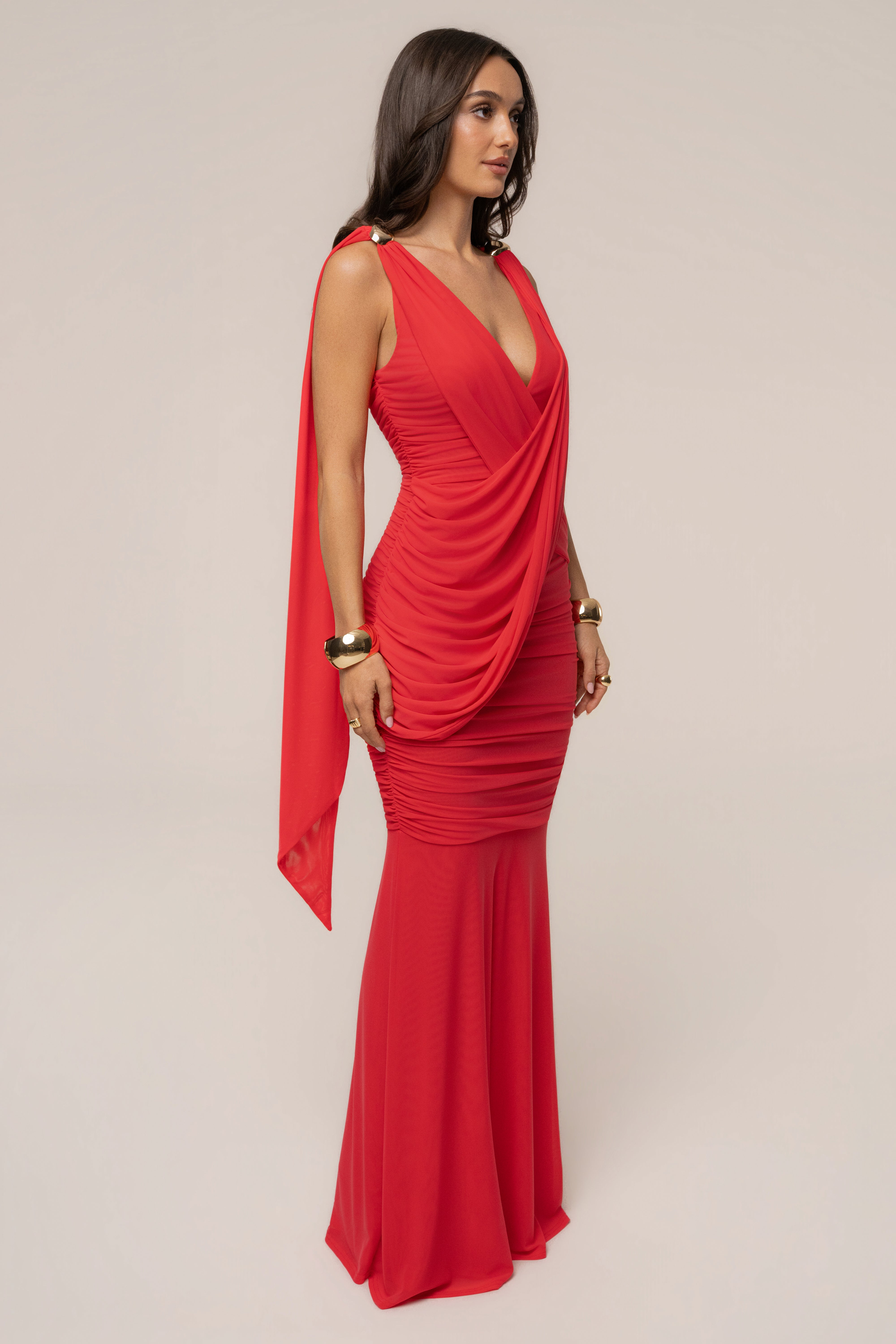 Hot coral Anastassia gold accent dress by JLUXLABEL, featuring a stylish fit and elegant design, shown on a model.