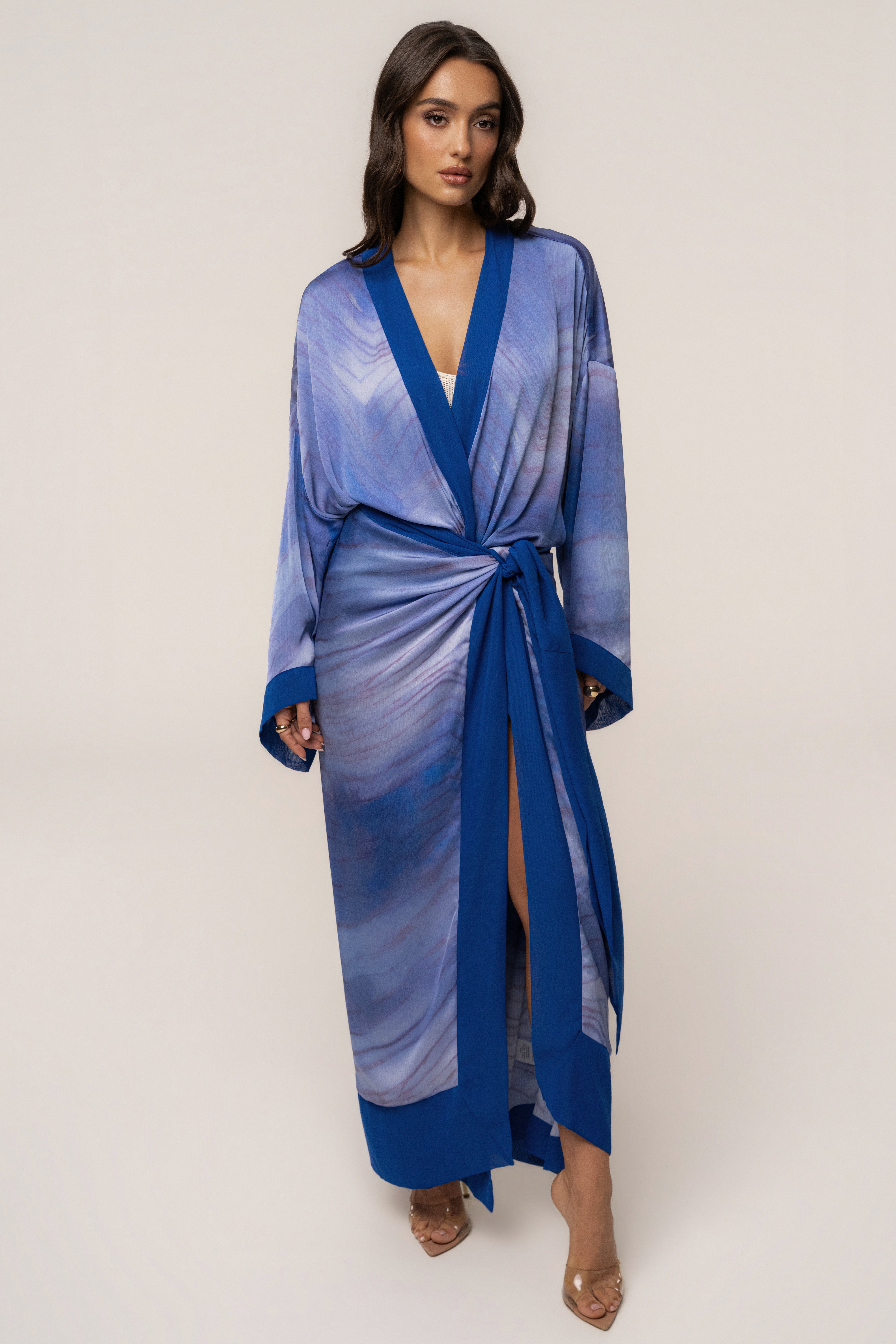 Blue Bahía Satin Duster outerwear by JLUXLABEL, shown as a flowing satin coat with long sleeves and a relaxed fit.