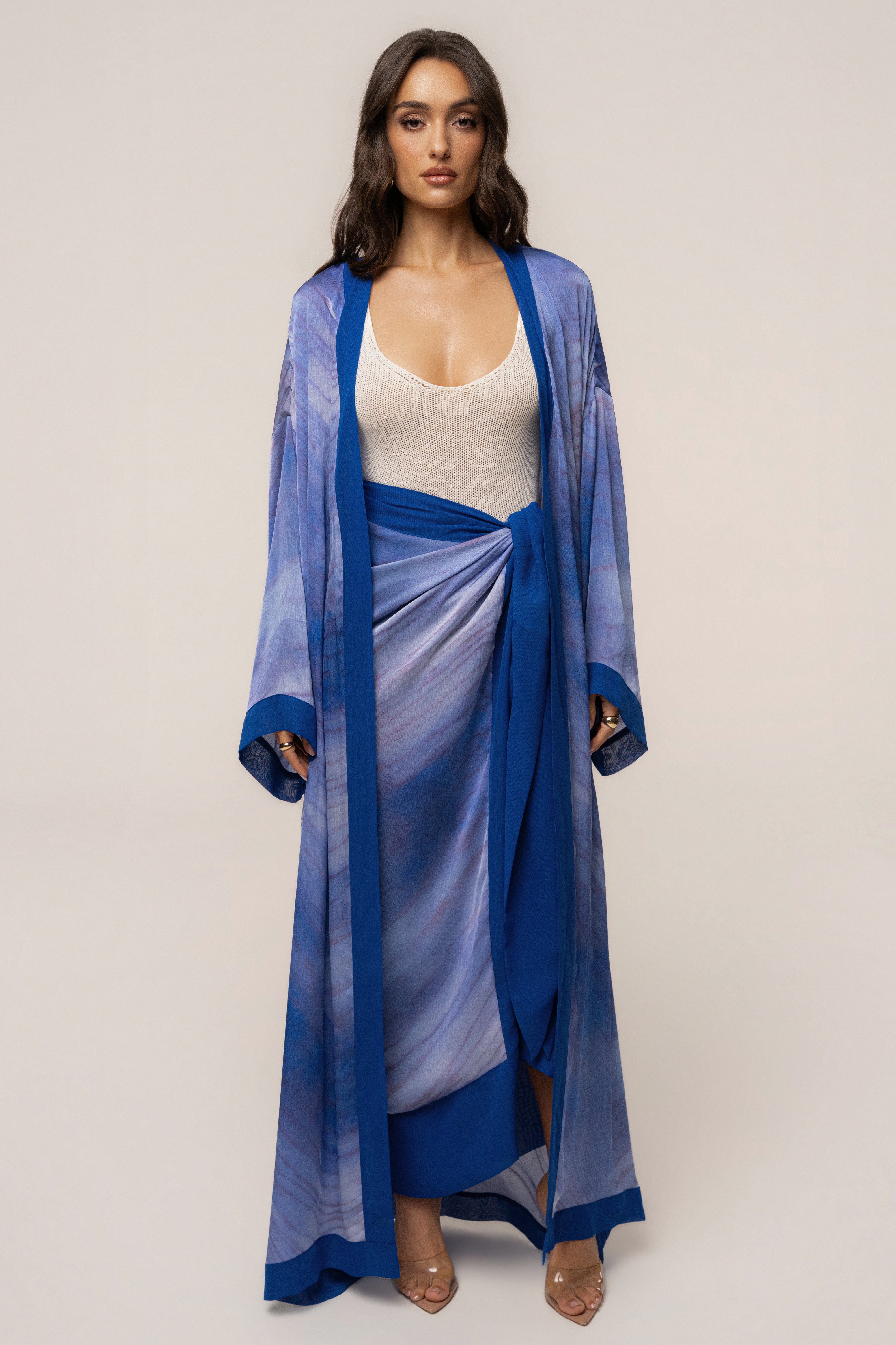 Blue Bahía Wrap Skirt from JLUXLABEL, showing the flowy fabric and stylish wrap design on a model.