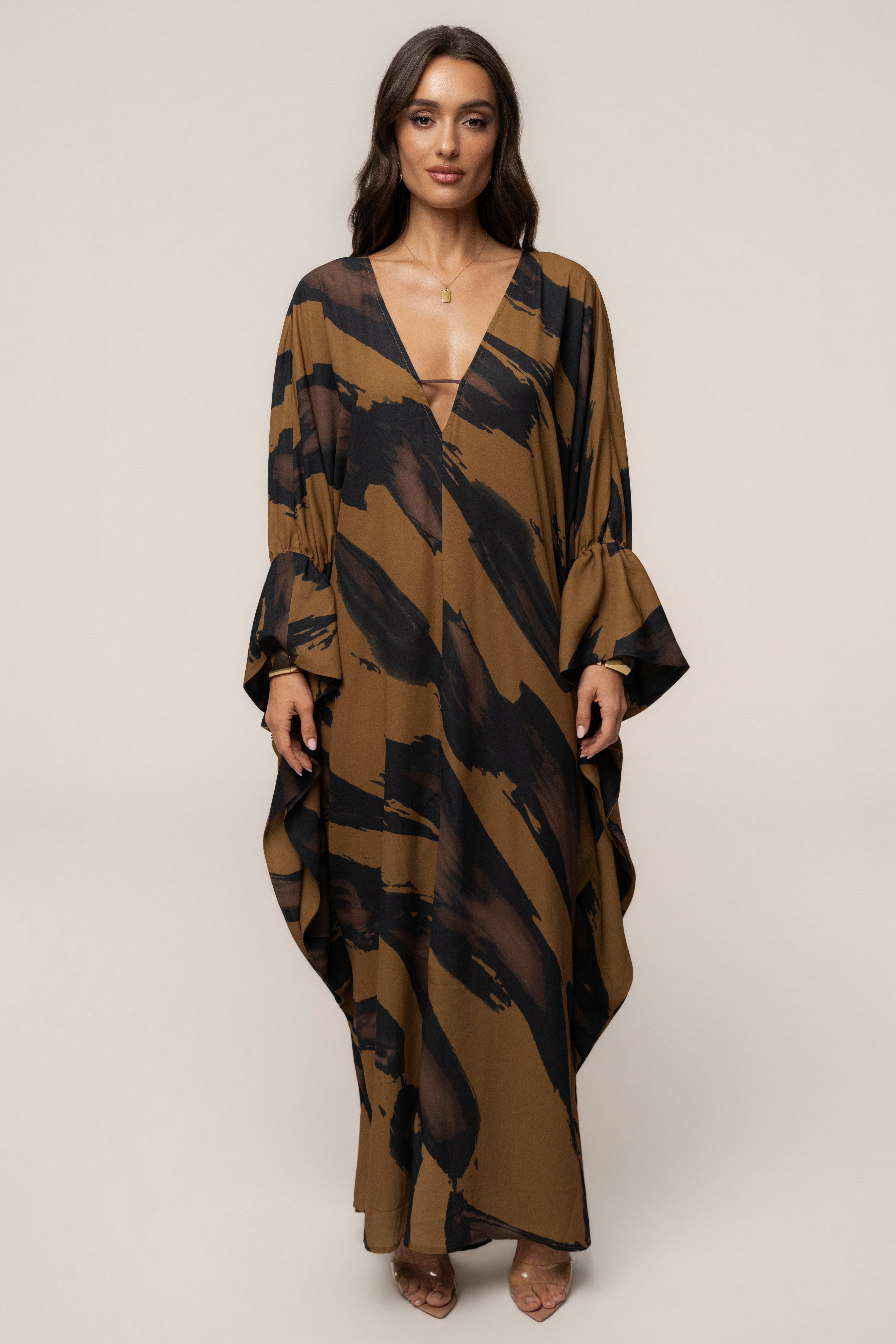Gold Dusk Sienna sheer cover-up dress by JLUXLABEL, flowing lightweight fabric with elegant drape and subtle shimmer.