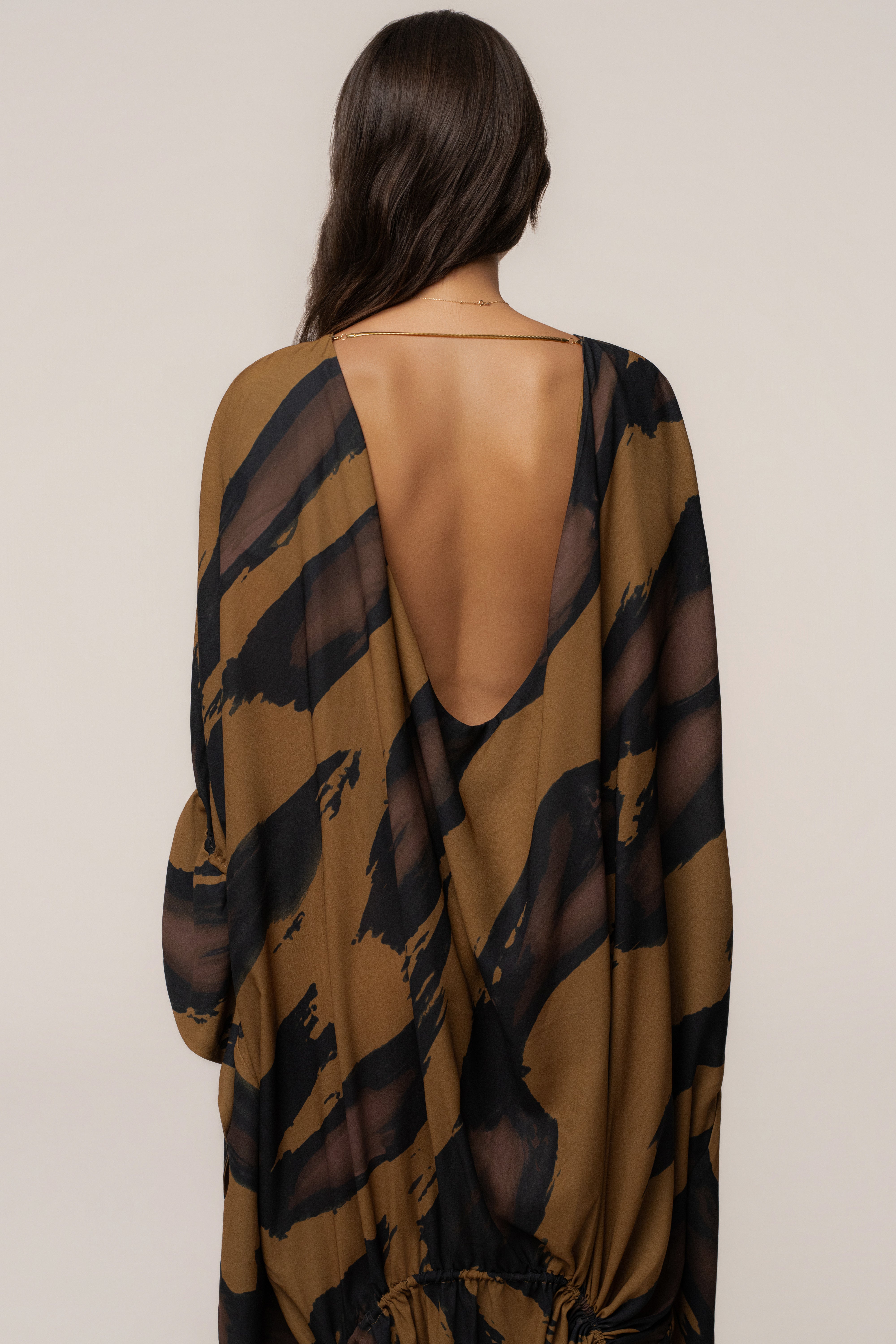 Gold Dusk Sienna sheer cover-up dress by JLUXLABEL, lightweight fabric, flowing design, perfect for layered summer looks.