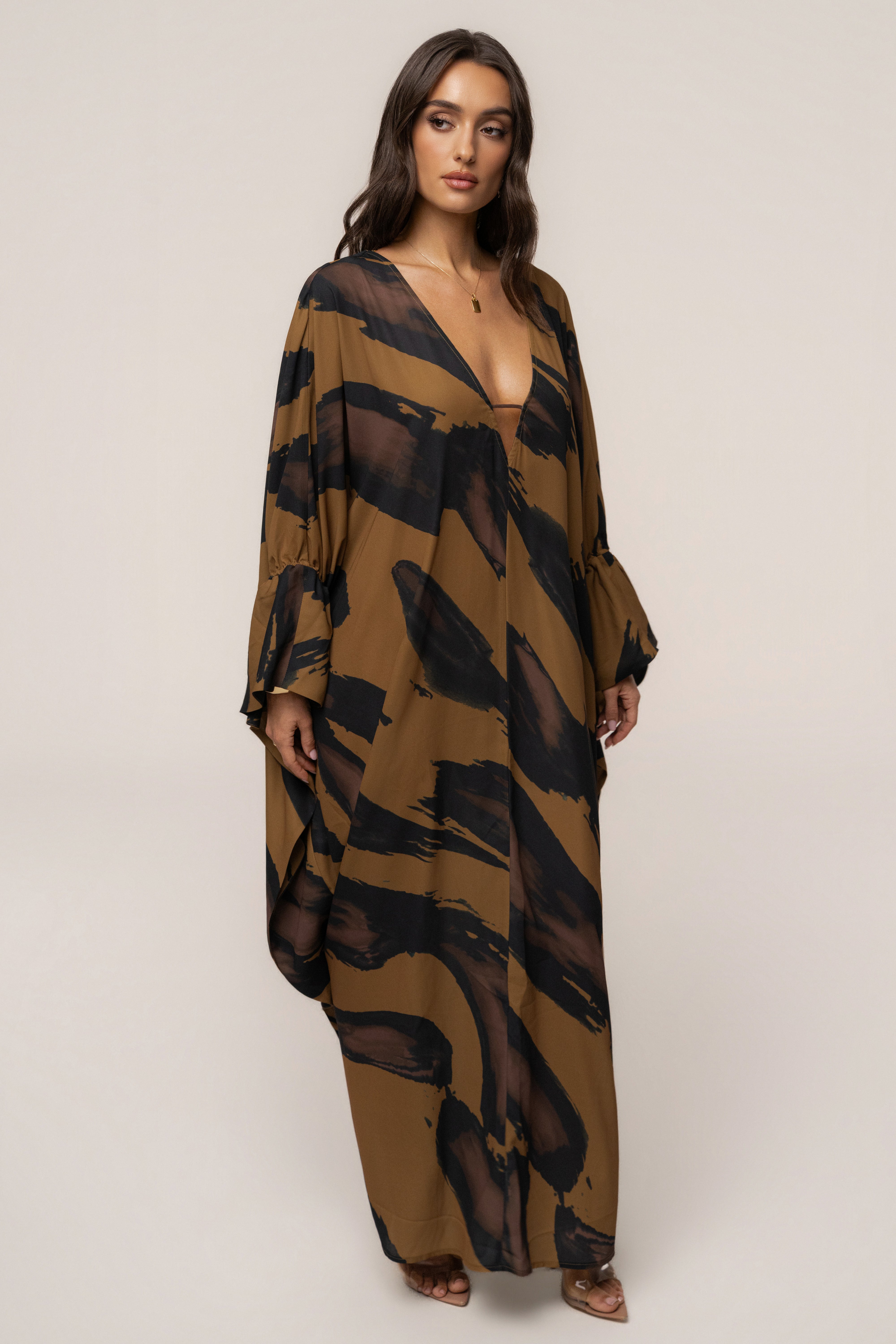 Gold Dusk Sienna sheer cover-up dress by JLUXLABEL, flowing lightweight fabric with elegant design and subtle gold accents.
