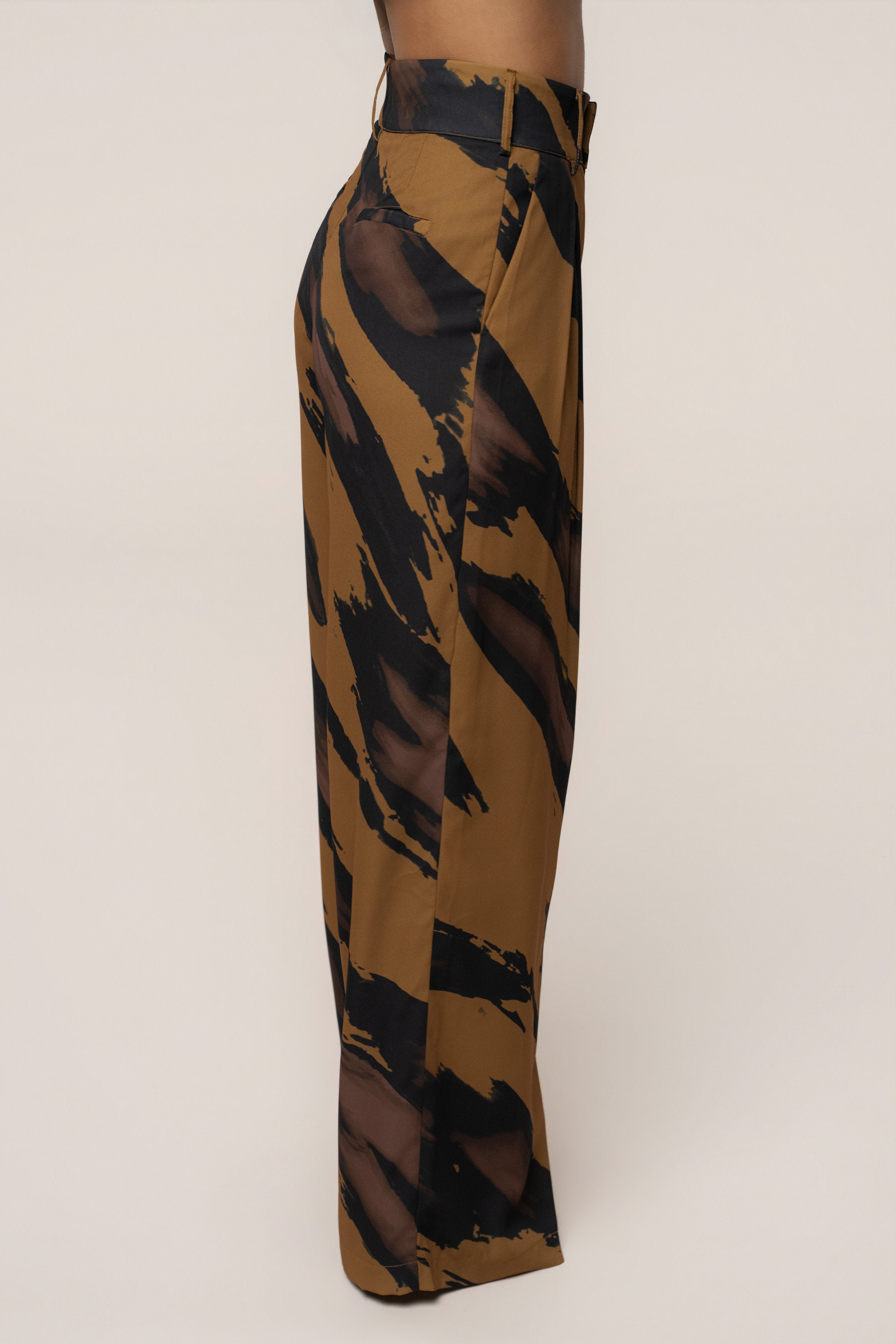 Gold Dusk JLUXLABEL soft pleated trousers, stylish bottoms with a relaxed fit and elegant pleats, suitable for casual or dressy wear.